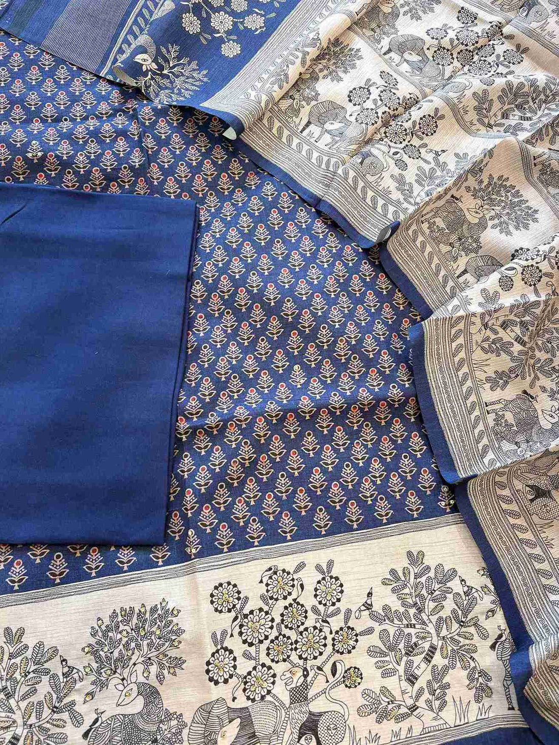 Close-up of printed small motifs with sequin embellishment on deep blue chanderi silk suit shirt