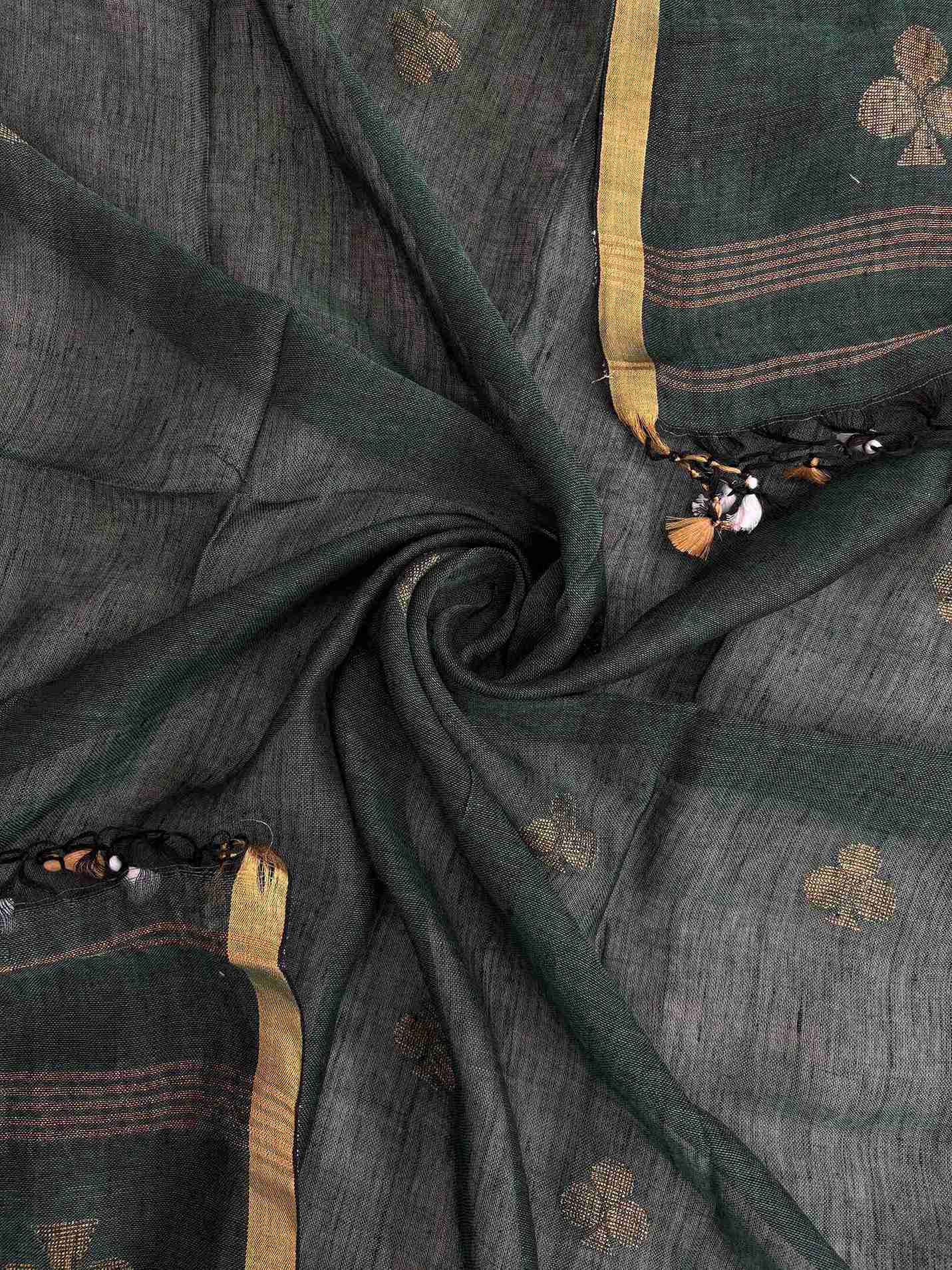 Scattered golden geometric spade woven motifs across deep green pure handloom linen dupatta surface