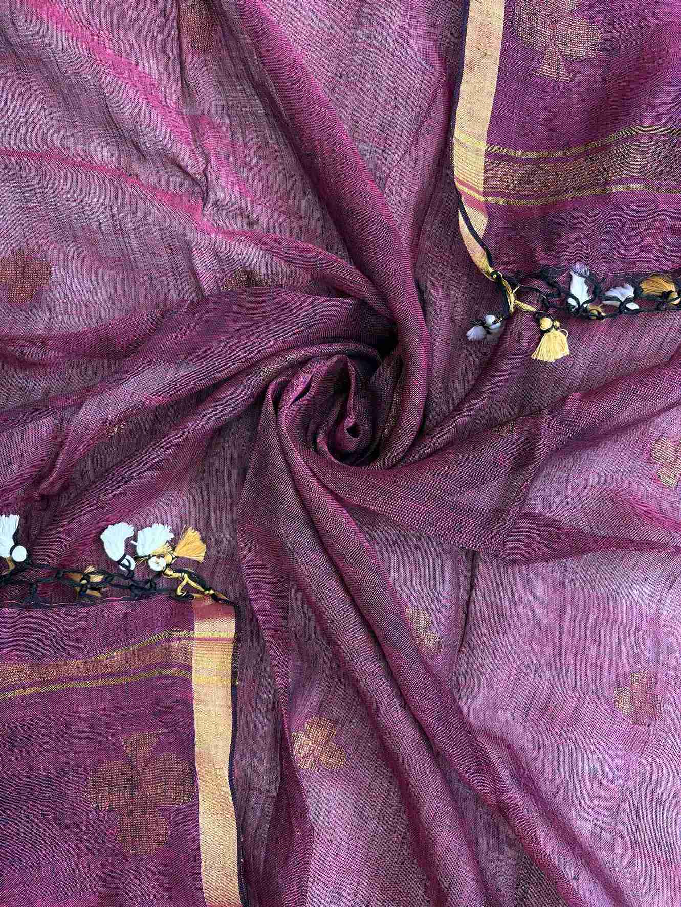 Gold zari woven border along edges of deep magenta pure handloom linen dupatta