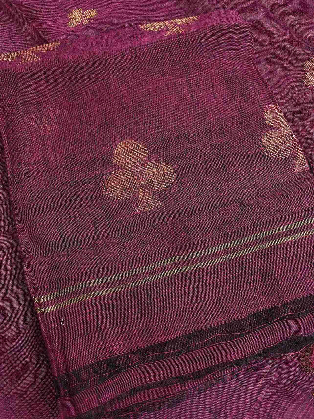 Scattered golden geometric spade woven motifs across deep magenta pure handloom linen shirt body