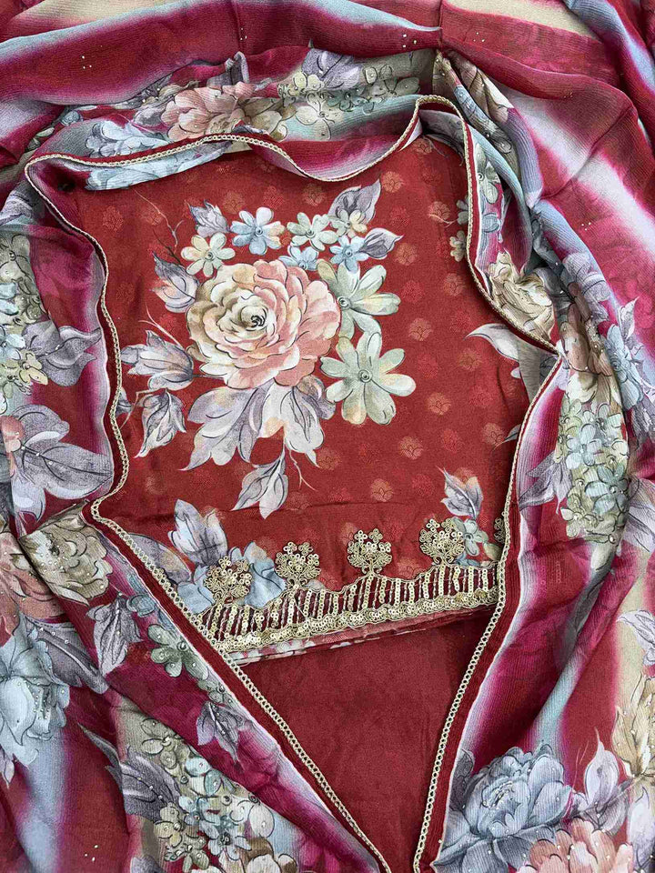 Close-up of all-over digital floral print in contrasting colors on deep red muslin shirt