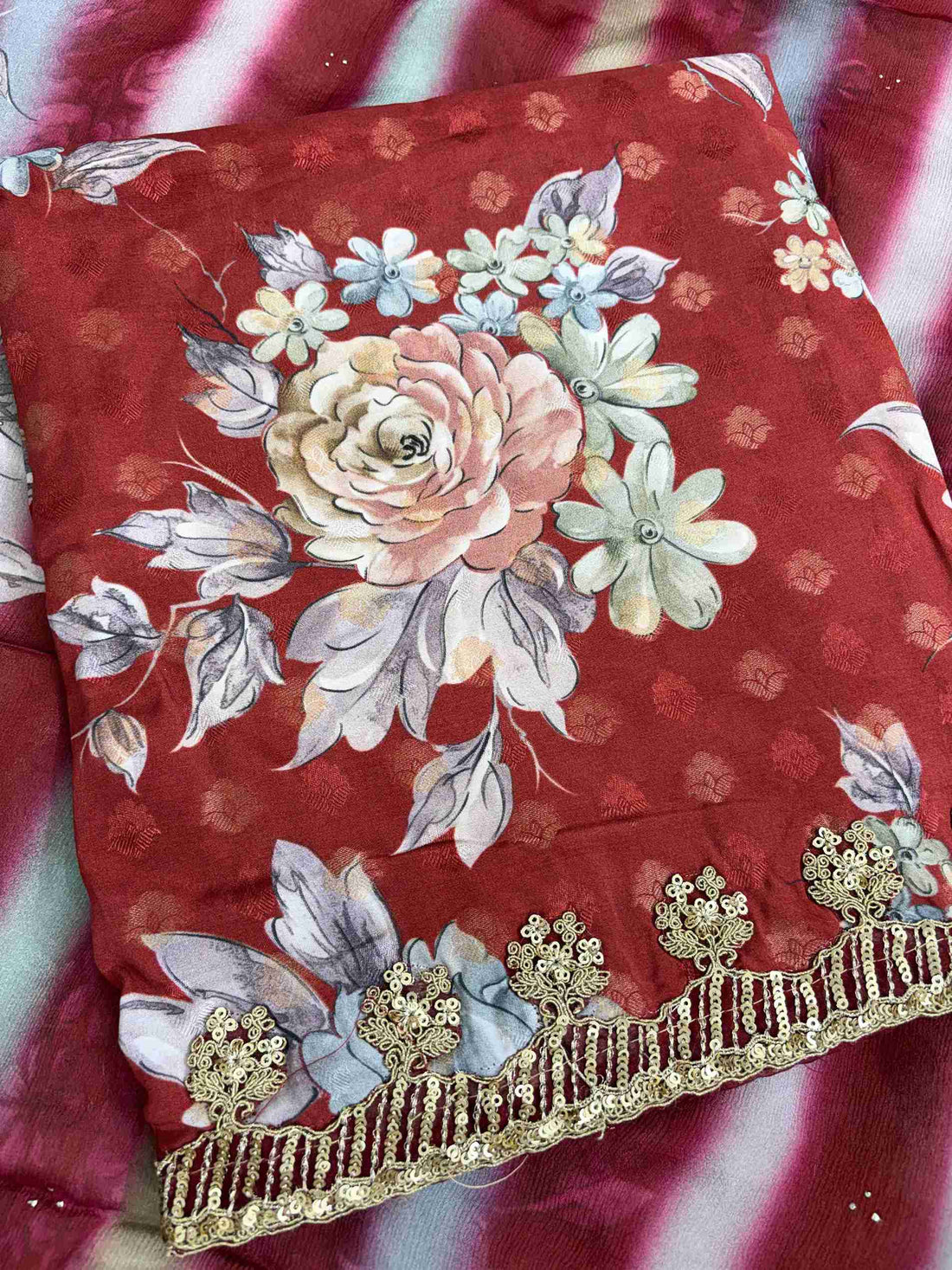 Round neckline detail on deep red digital print muslin unstitched shirt
