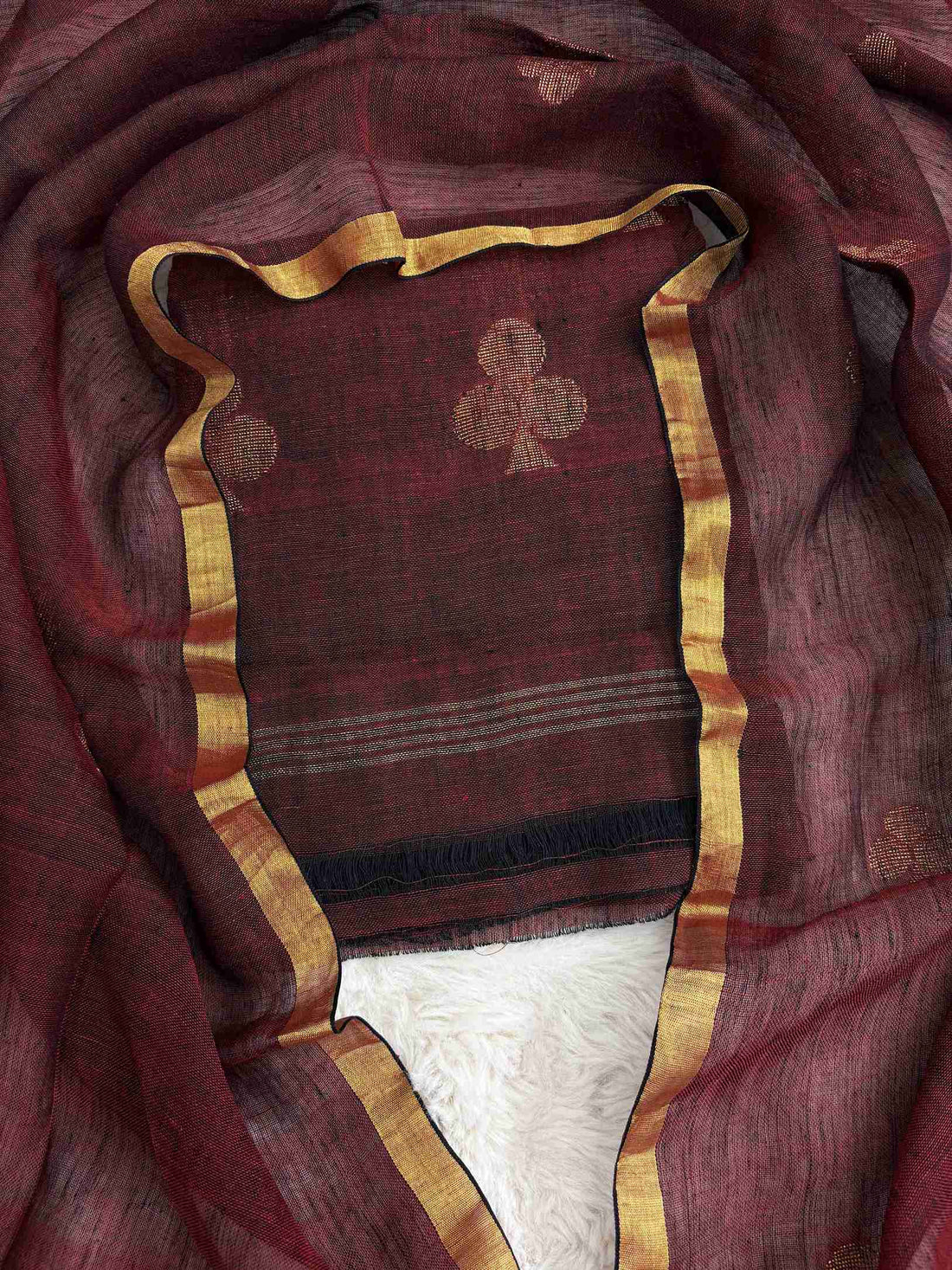 Scattered golden geometric spade woven motifs across deep-red pure handloom linen shirt body