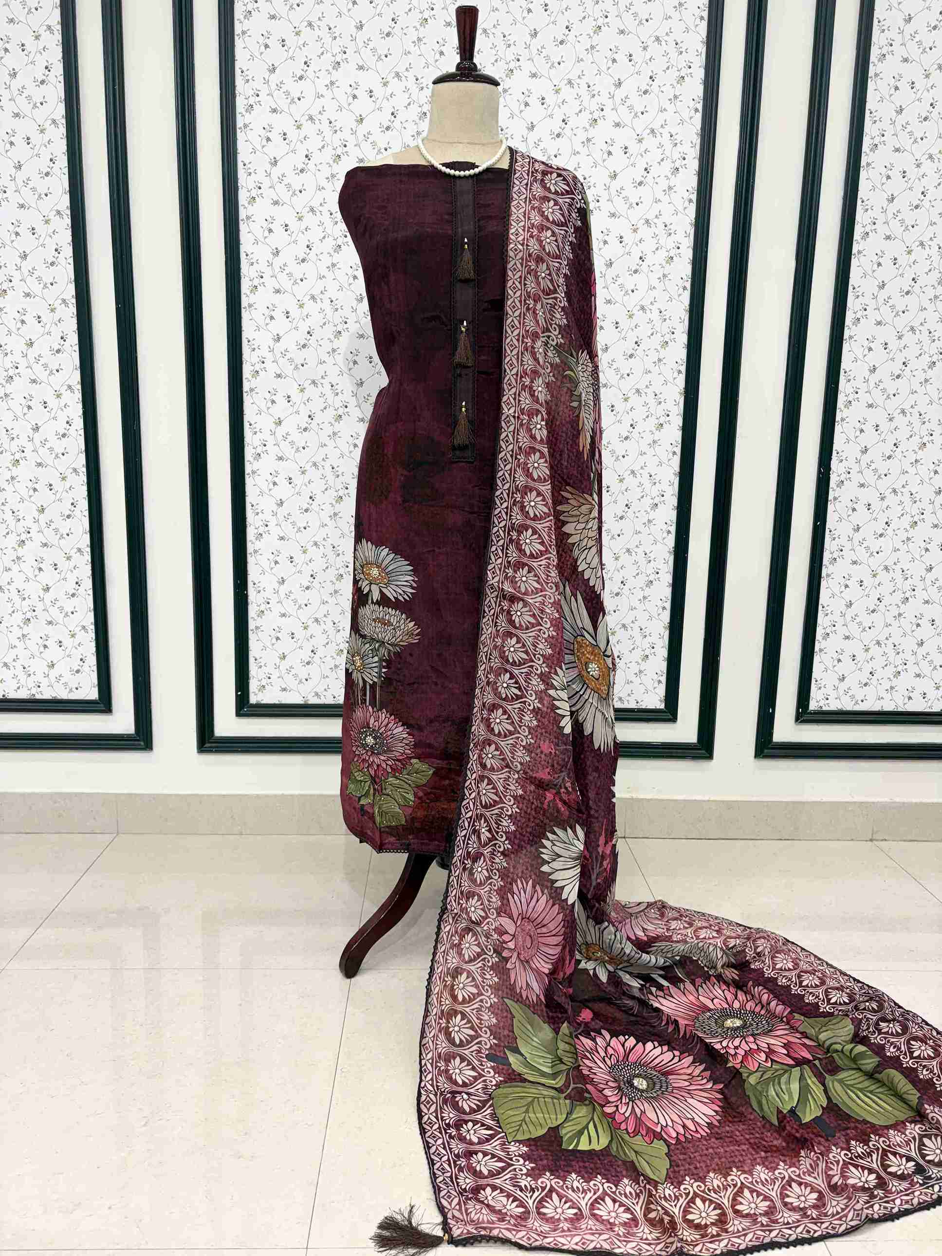Deep wine silk organza unstitched suit full front view with matching printed dupatta draped on mannequin