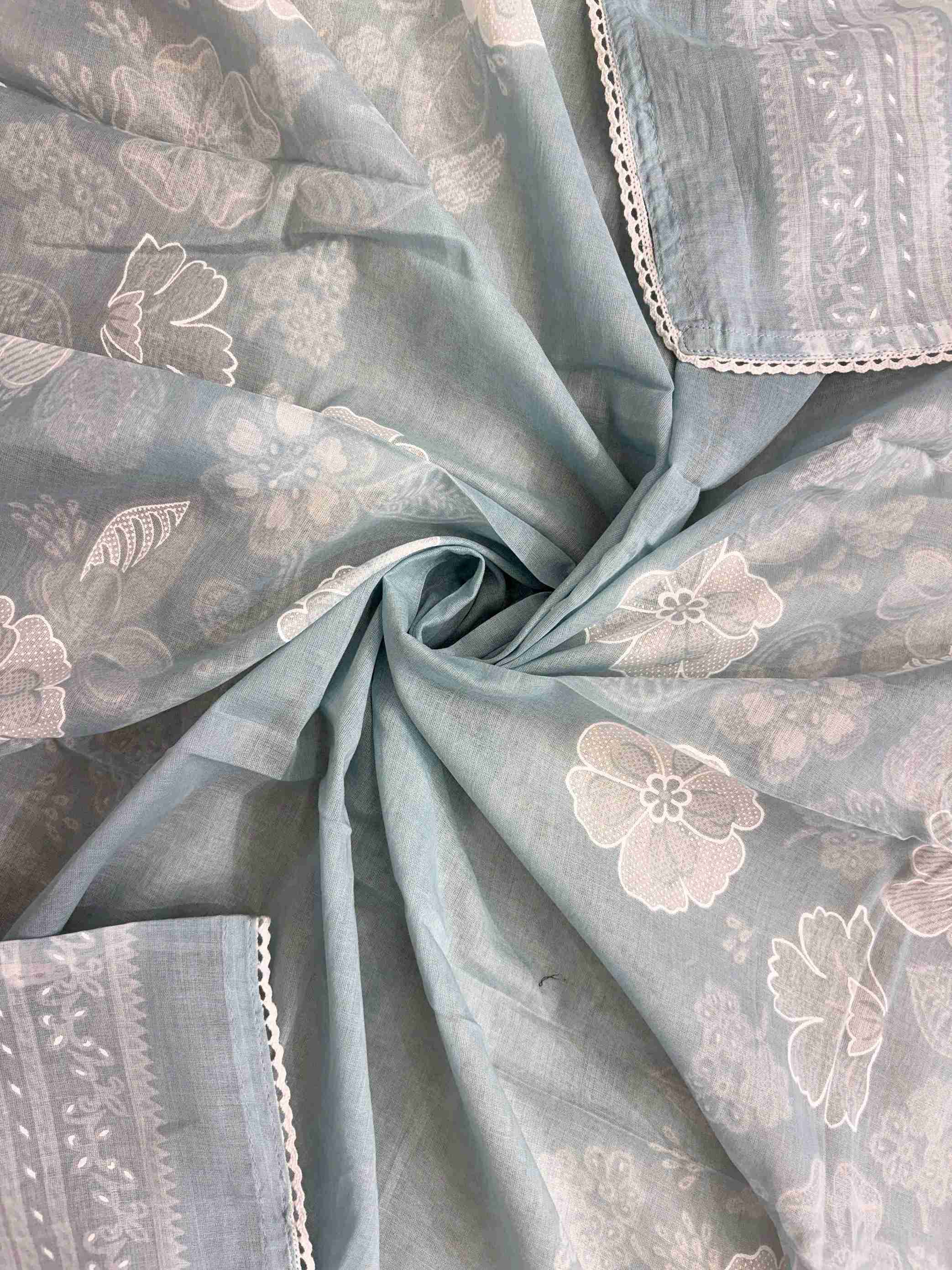 All-over white floral digital print with white lace border finishing on dusty blue cotton dupatta