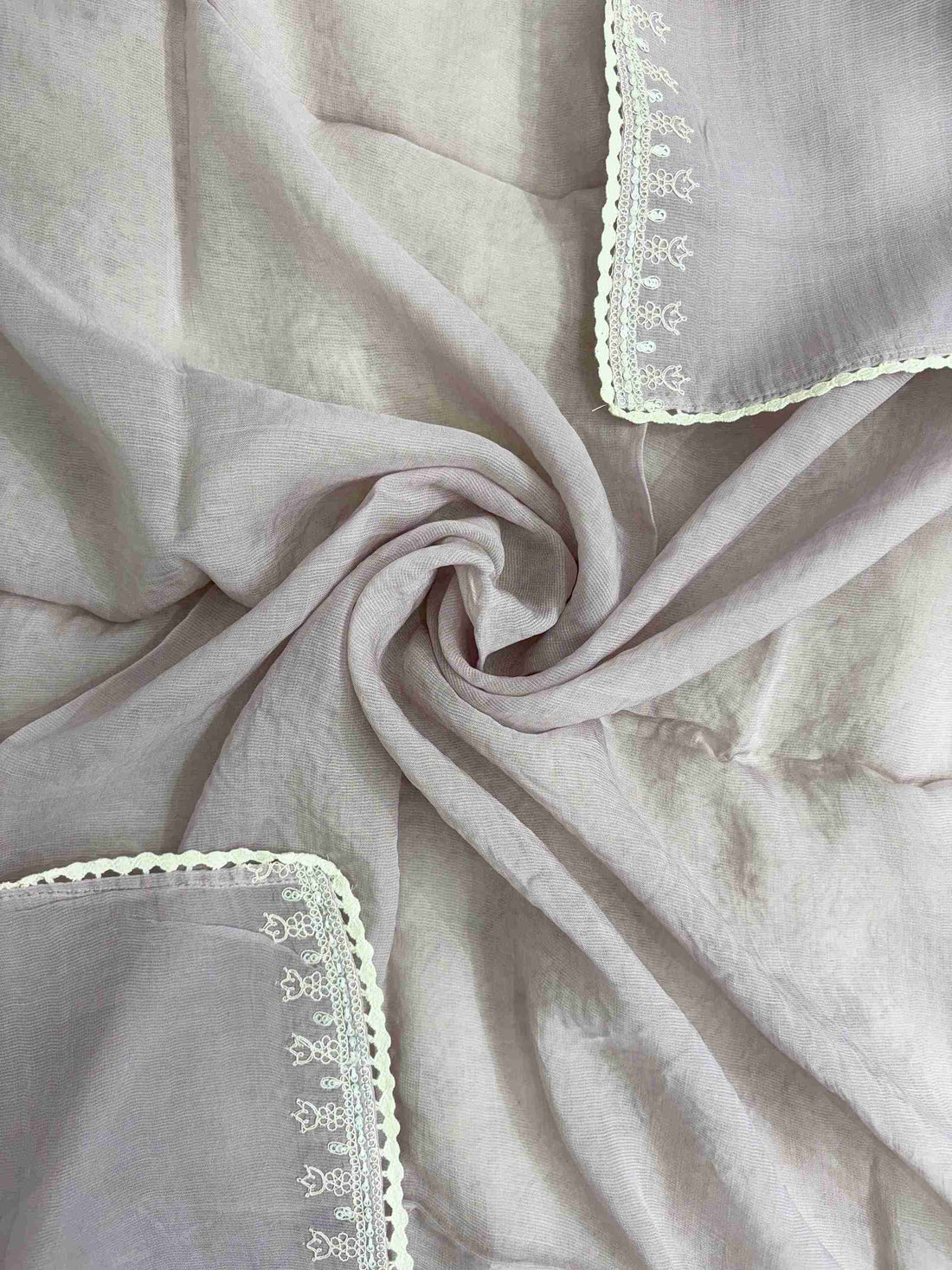 White floral applique motifs at corner of dusty rose mauve mul cotton dupatta