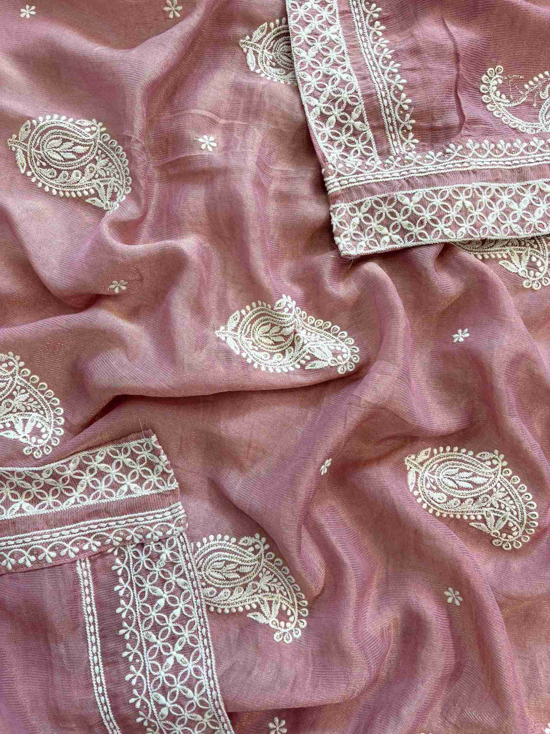 Embroidered dupatta border with white thread chikankari inspired motifs on shimmer tissue fabric