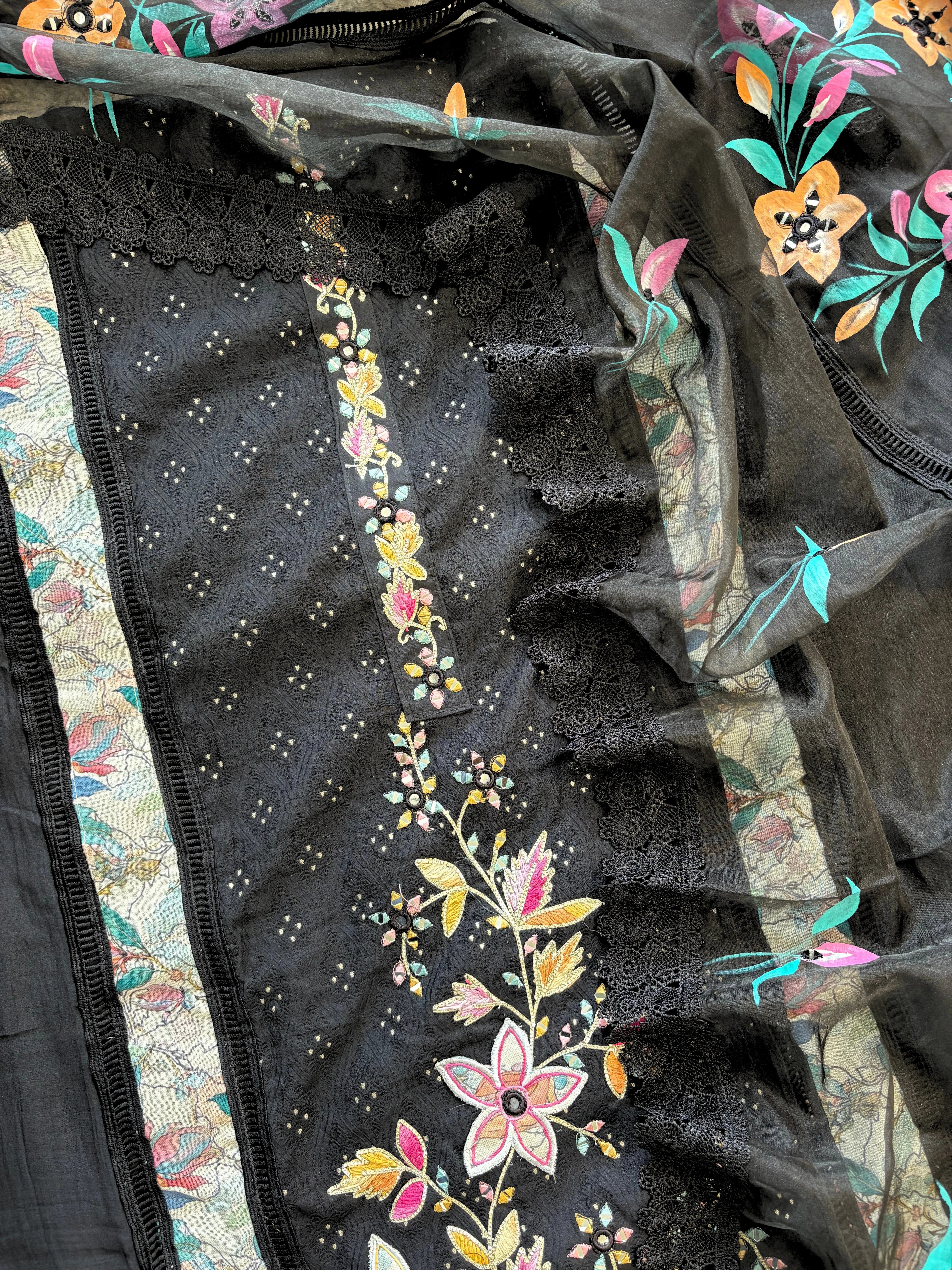 black linen suit with embroidered detailing and hand-painted floral organza dupatta, finished with lace border – unstitched ethnic wear set
