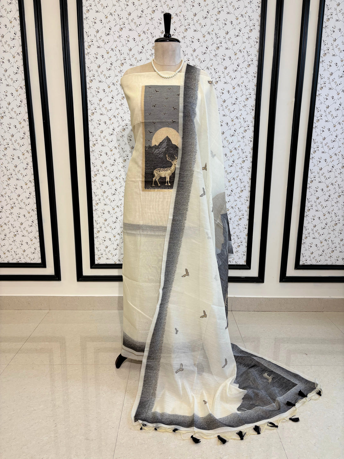 Grey and ivory Jamdaani suit with woven mountain, deer, and bird motifs, made with fine handloom weaving, perfect for winter and festive occasions.
