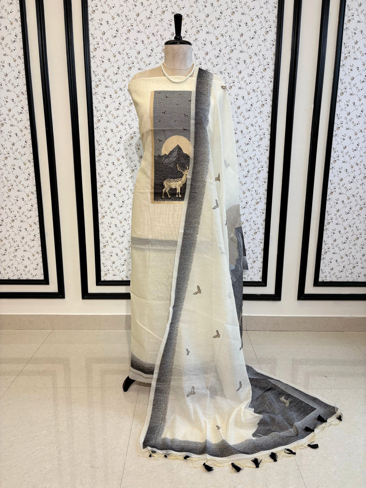 Grey and ivory Jamdaani suit with woven mountain, deer, and bird motifs, made with fine handloom weaving, perfect for winter and festive occasions.