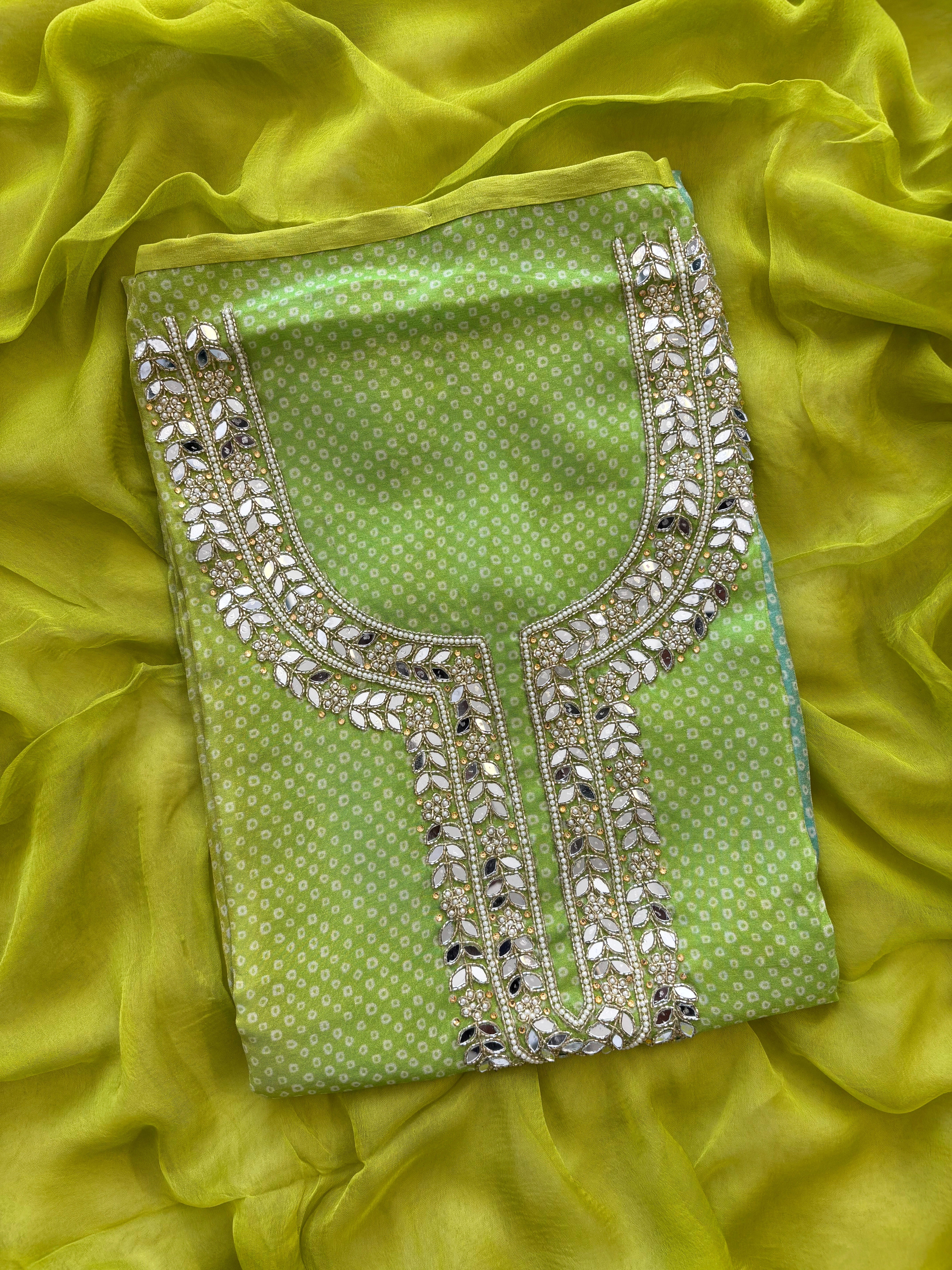 Lime Green Shimmer organza bandhani suit with ombre effect and chiffon dupatta with lace border.