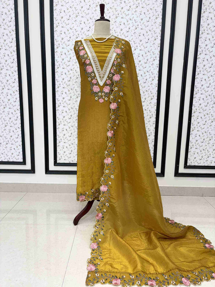 Tissue unstitched suit with pink and ivory floral embroidery on neck