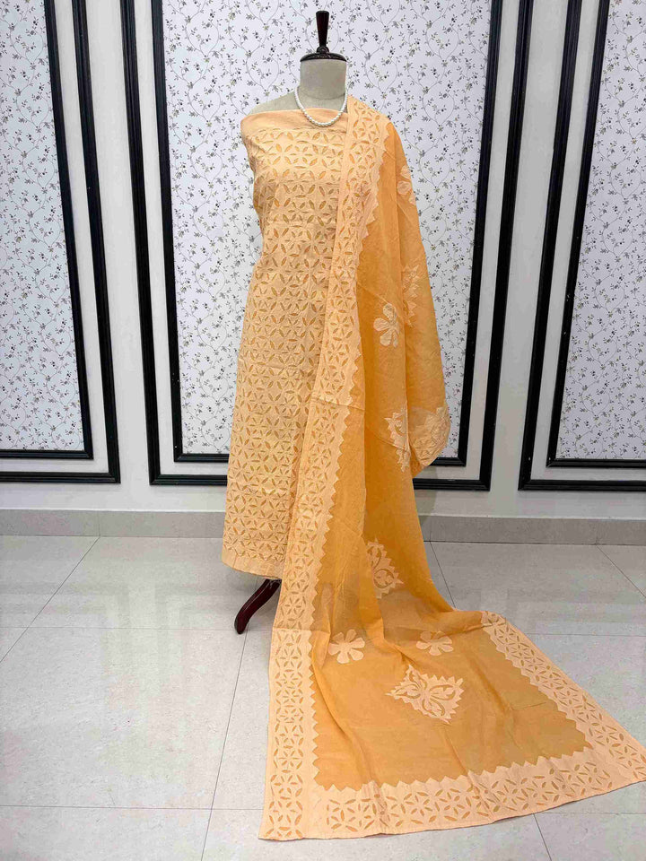 Elegant peach pure cotton ethnic suit set with all-over applique jaali hand embroidery