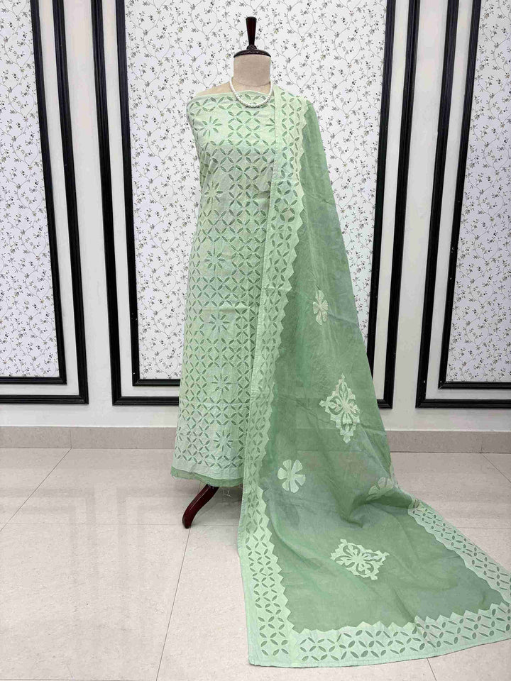 Elegant sage green pure cotton ethnic suit set with all-over applique jaali embroidery