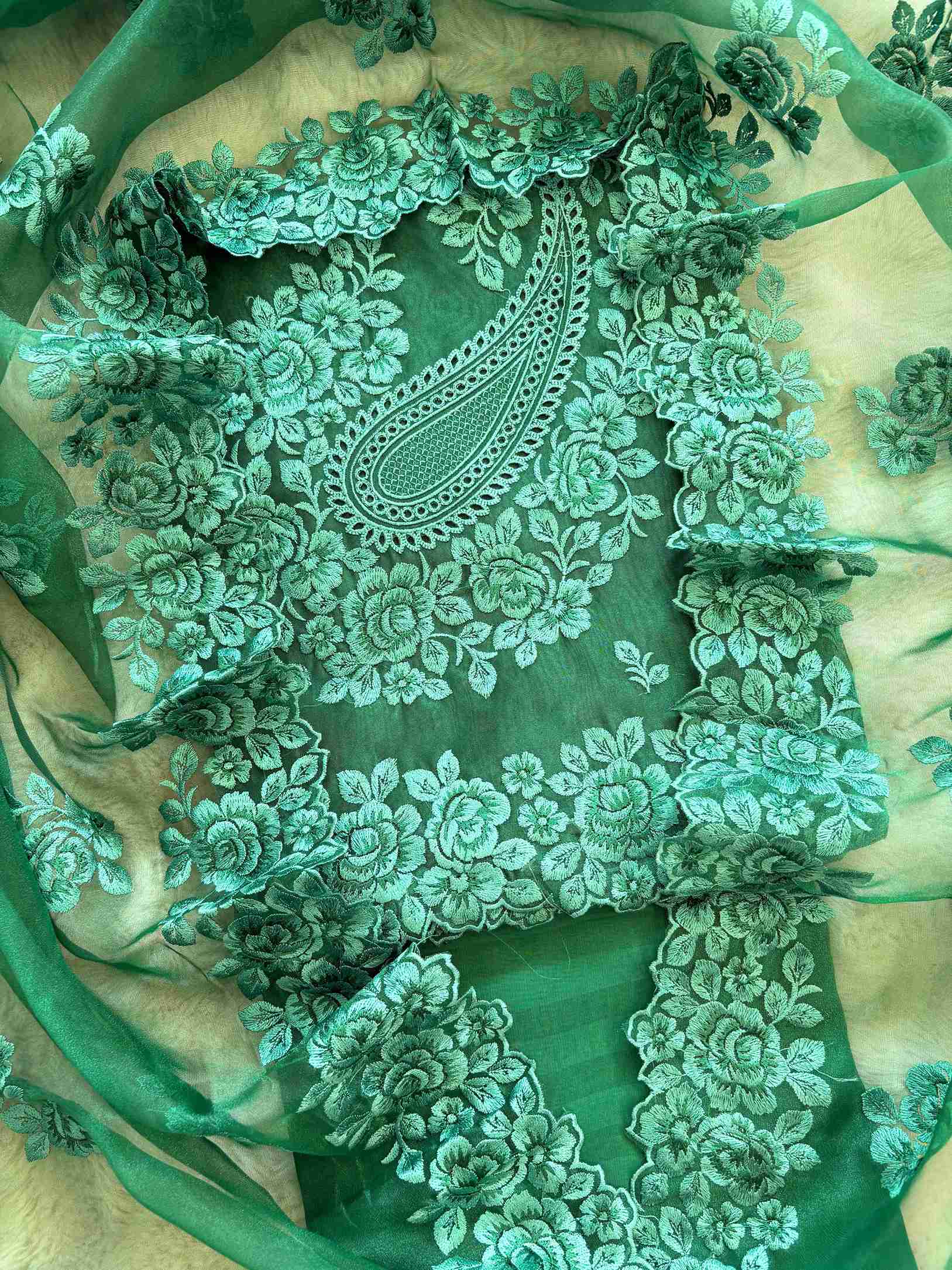 Emerald green glass tissue unstitched suit with heavy floral thread embroidery