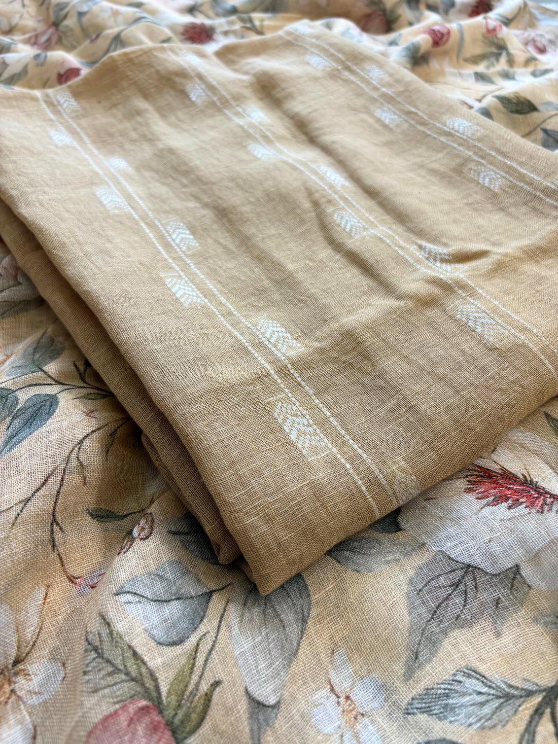 beige linen suit with minimal white thread embroidery on kurta and floral digital printed dupatta, perfect for summer events and festive daywear.