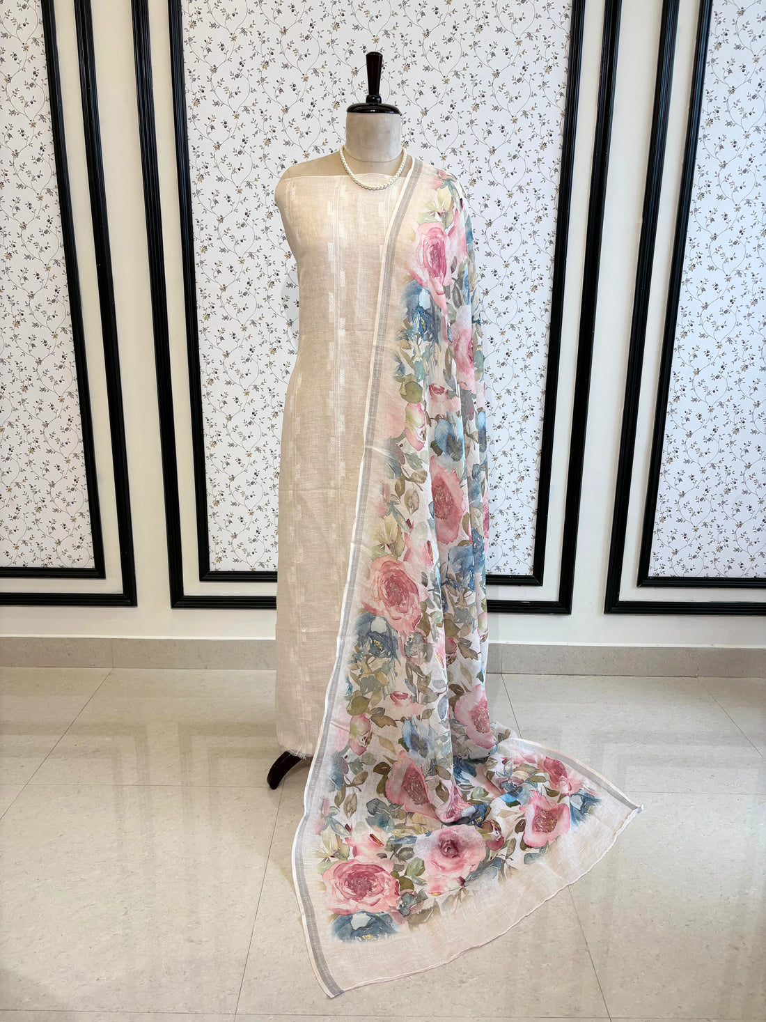 ivory linen suit with minimal white thread embroidery on kurta and floral digital printed dupatta, perfect for summer events and festive daywear.