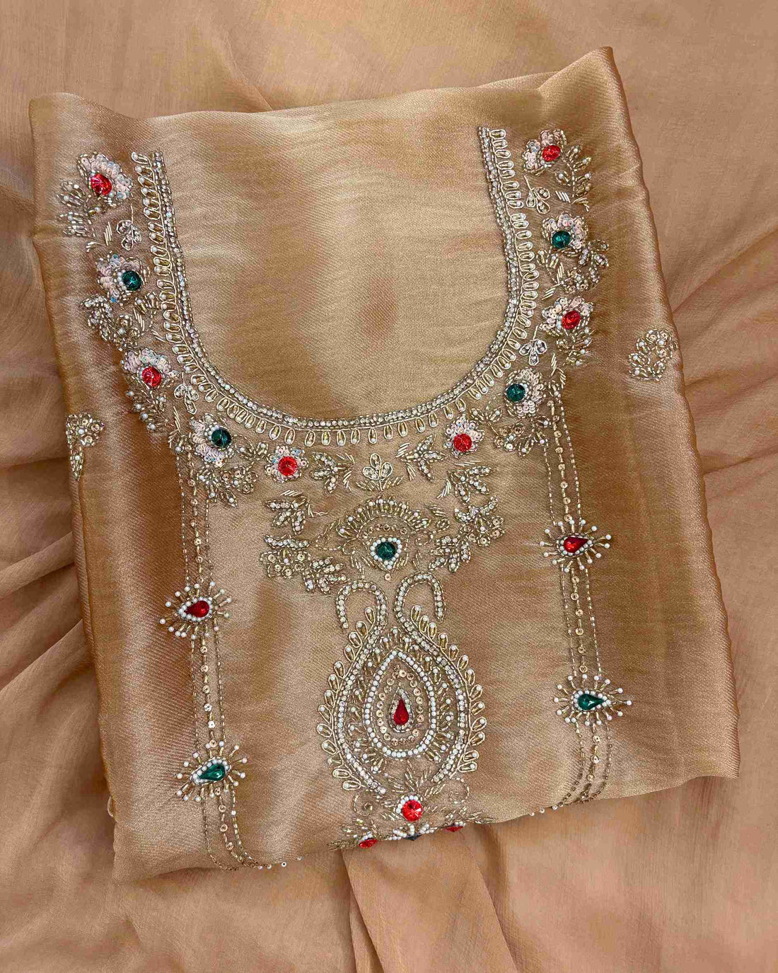 Golden beige cotton silk bottom fabric flatlay