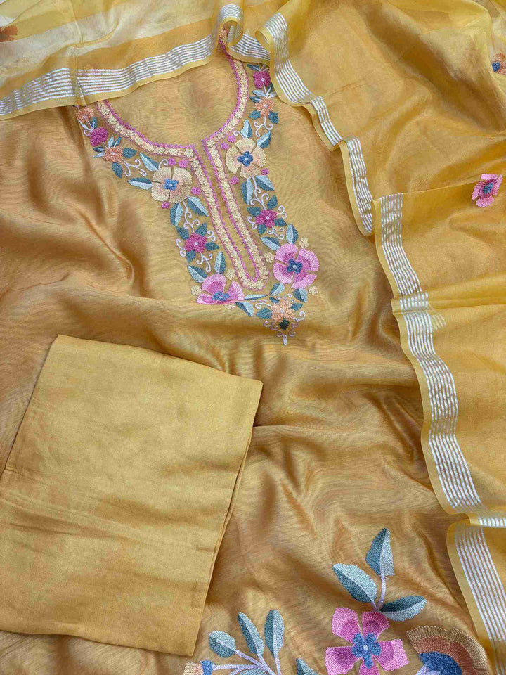 Golden yellow cotton silk bottom fabric flatlay