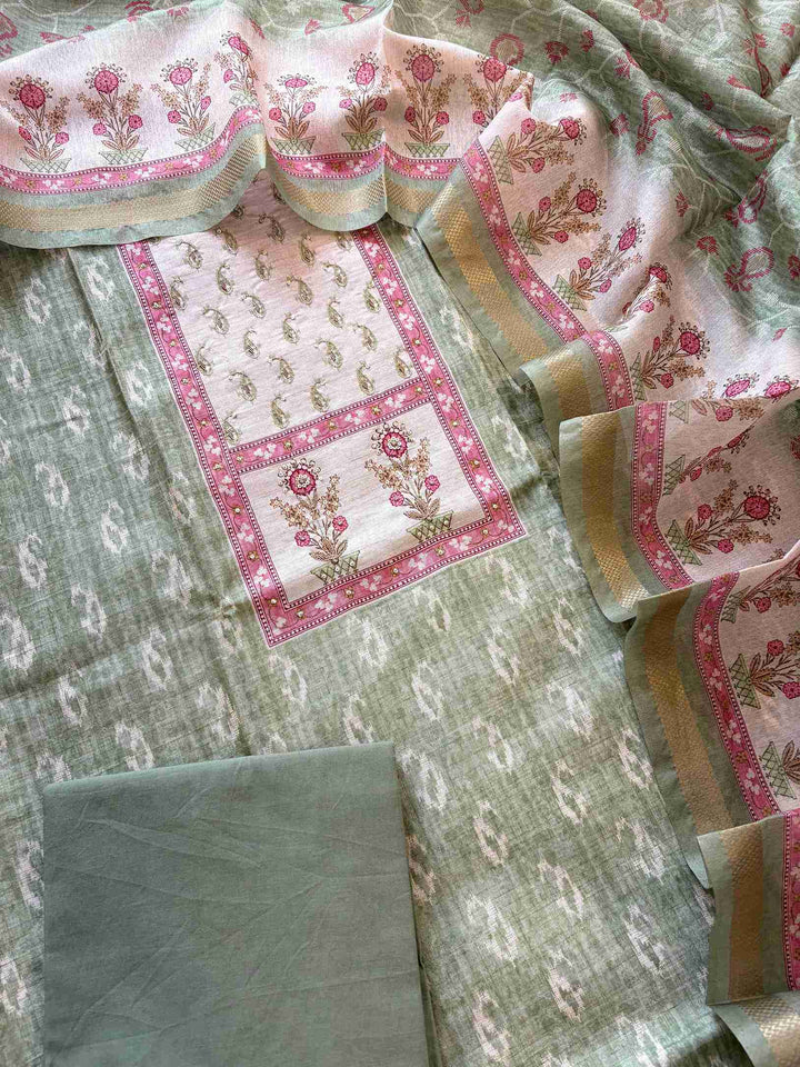 Floral motif print border on the hemline of green Chanderi suit