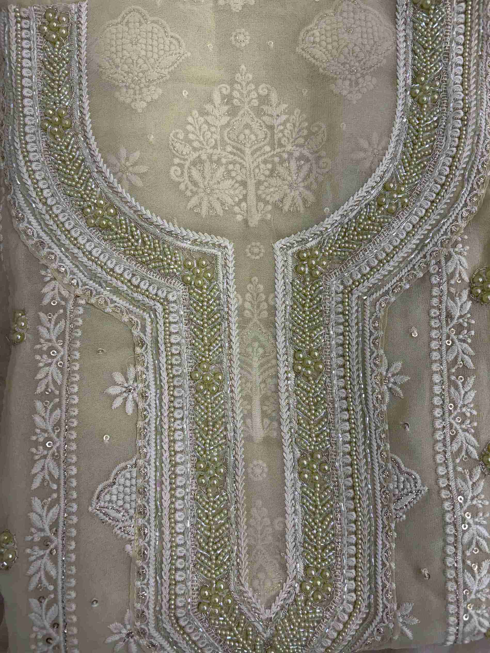 Mint green georgette shirt featuring all-over chikankari embroidery with panel design