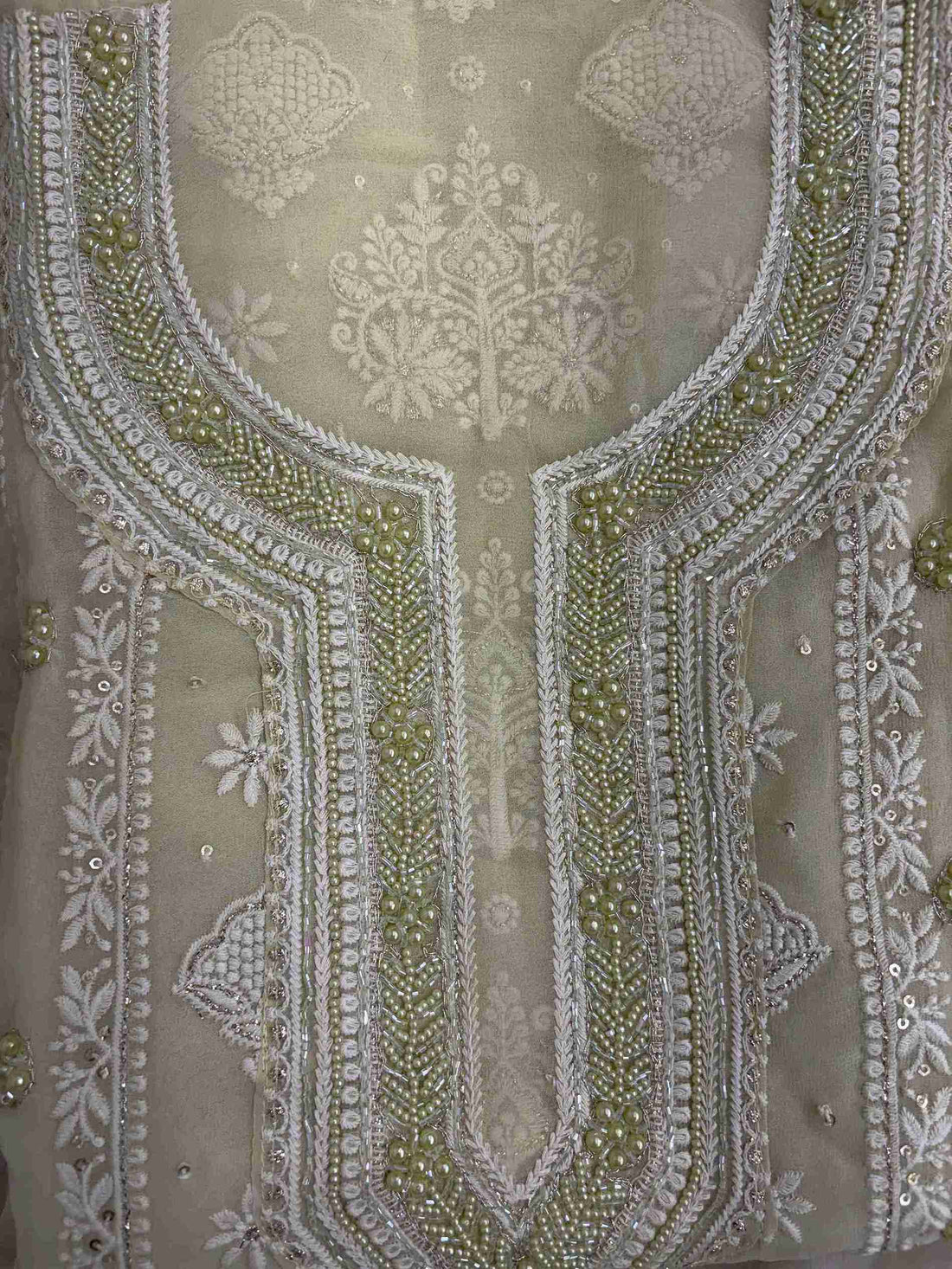 Mint green georgette shirt featuring all-over chikankari embroidery with panel design