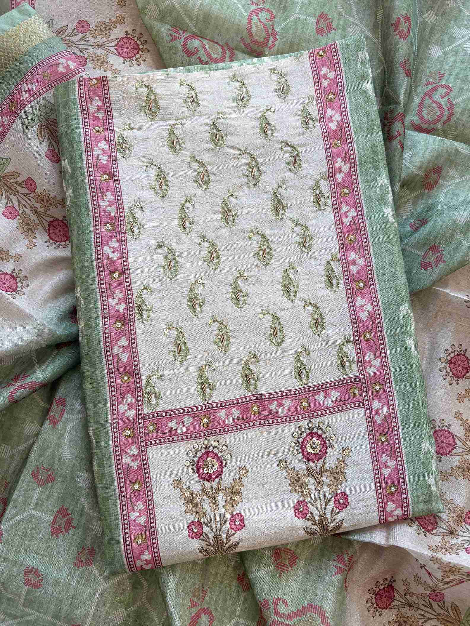 Green cotton bottom fabric flatlay
