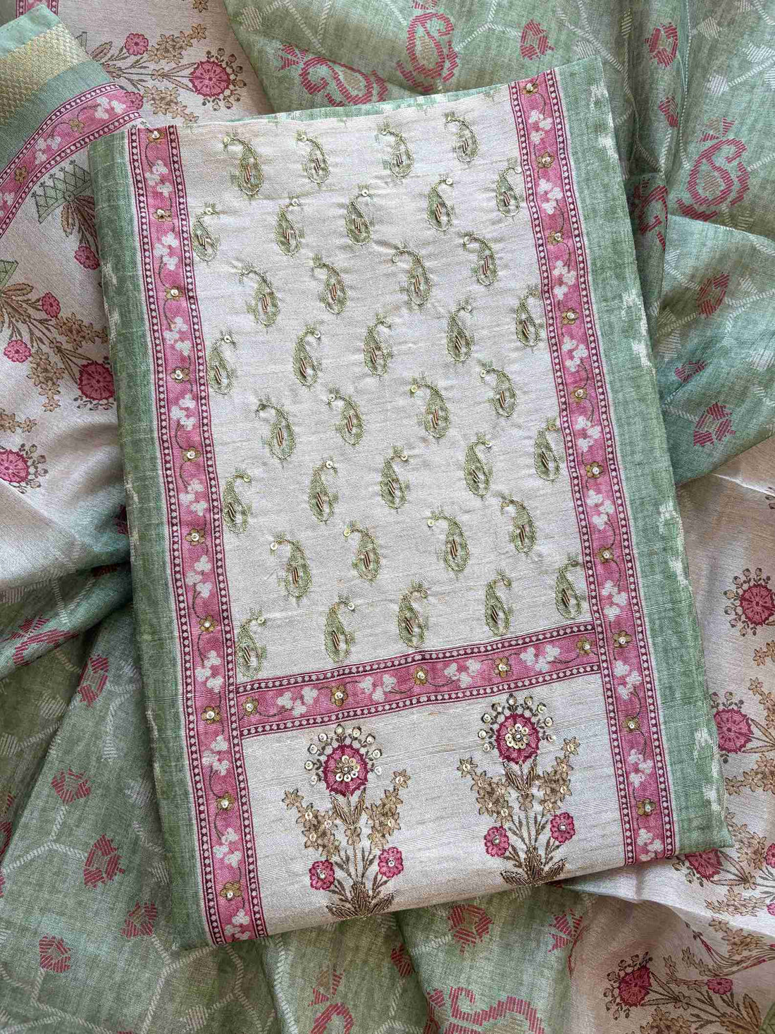 Green cotton bottom fabric flatlay
