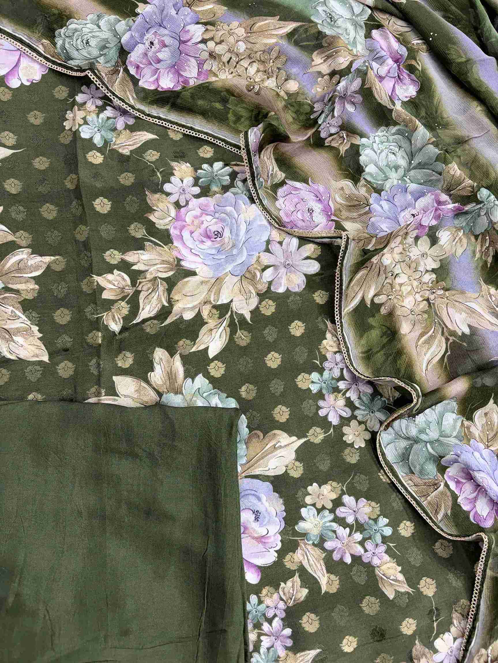Complete green muslin unstitched suit set with shirt, chinnon dupatta, and silk bottom