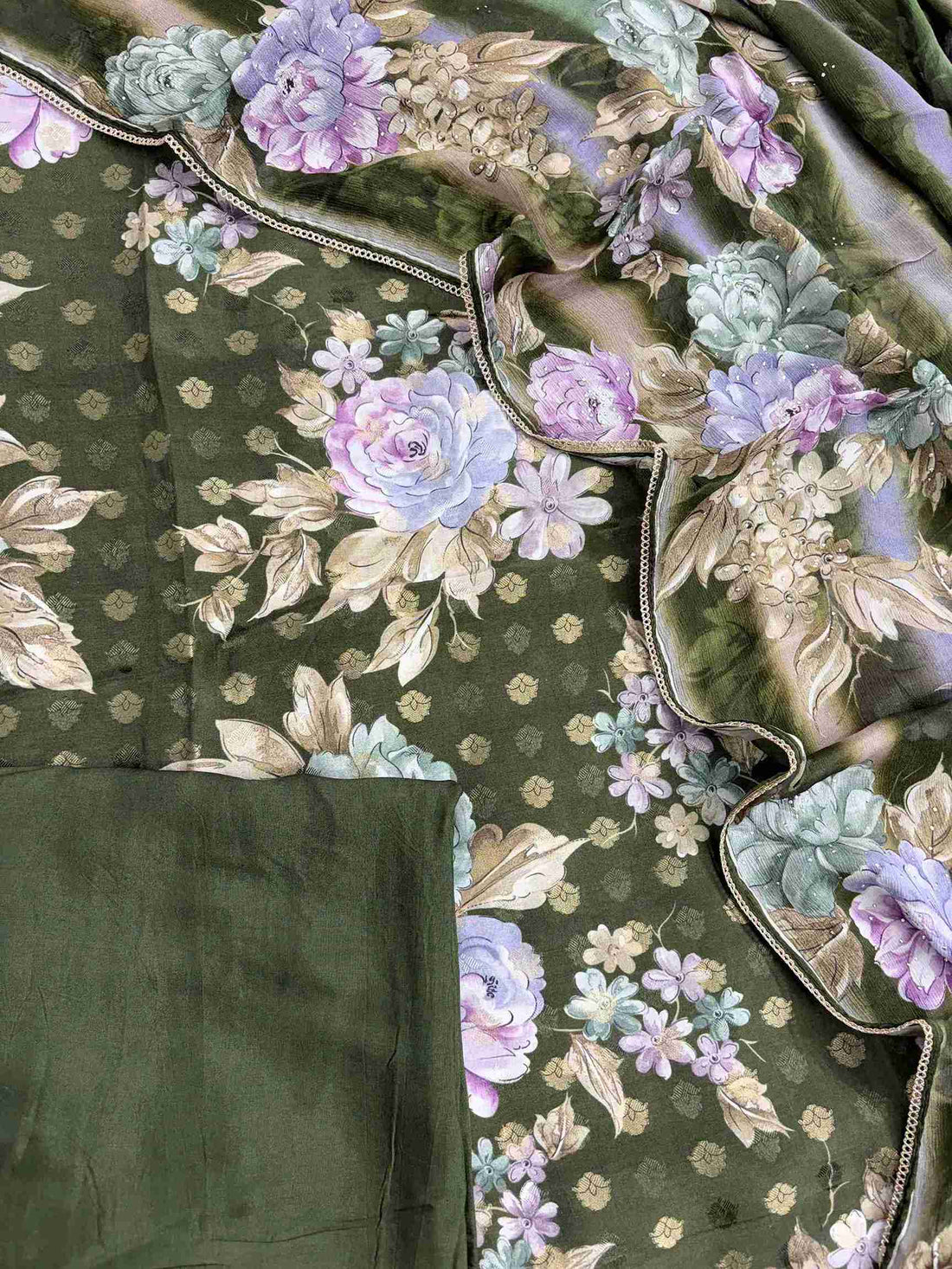 Complete green muslin unstitched suit set with shirt, chinnon dupatta, and silk bottom