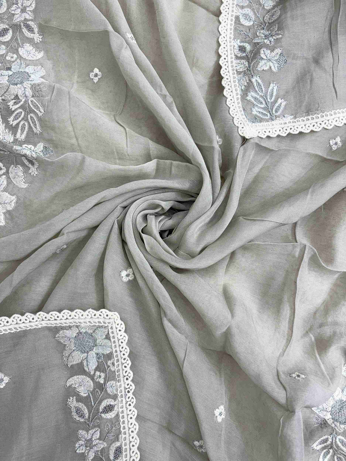 Scattered booties detail across the surface of grey linen dupatta