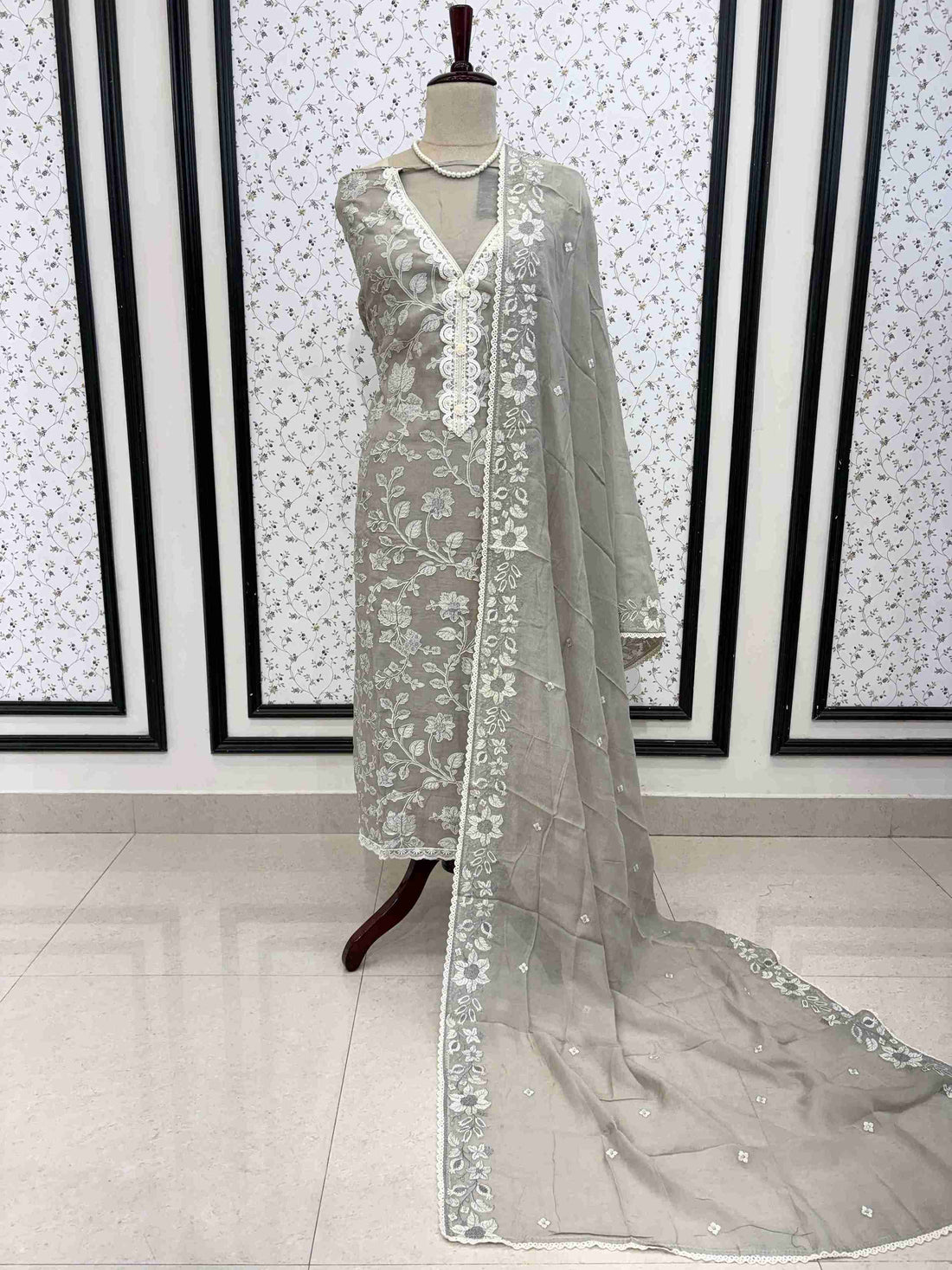 grey linen unstitched suit full front view with dupatta draped on mannequin