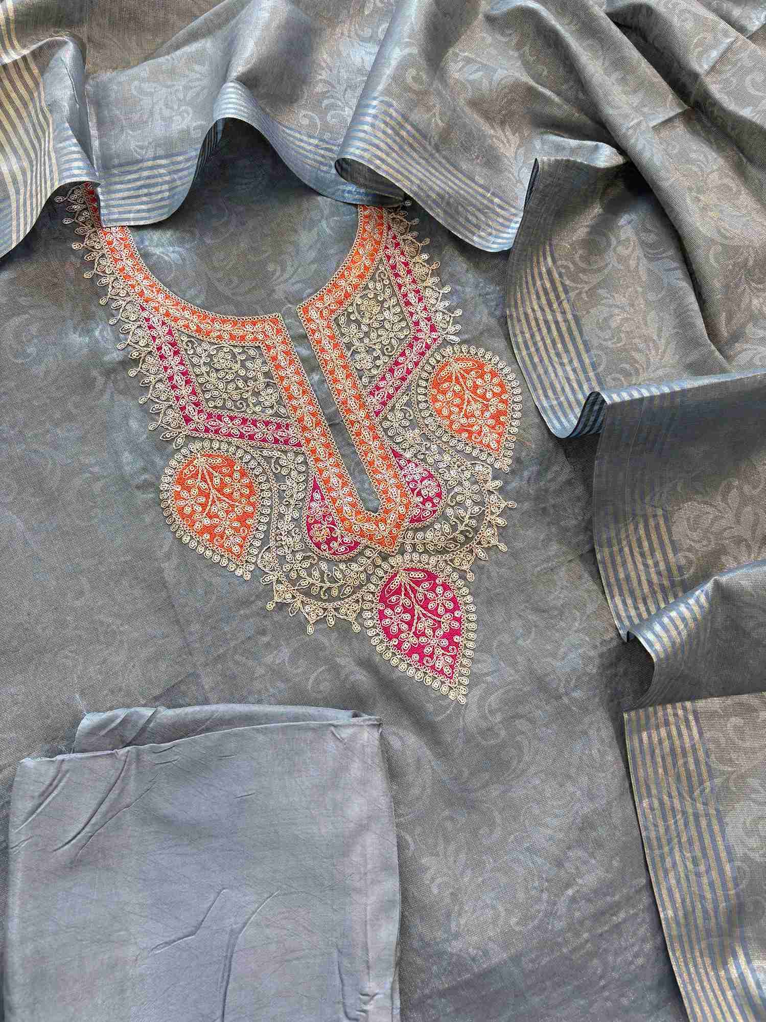 Detailed view of handcrafted chikankari inspired embroidery on tissue fabric