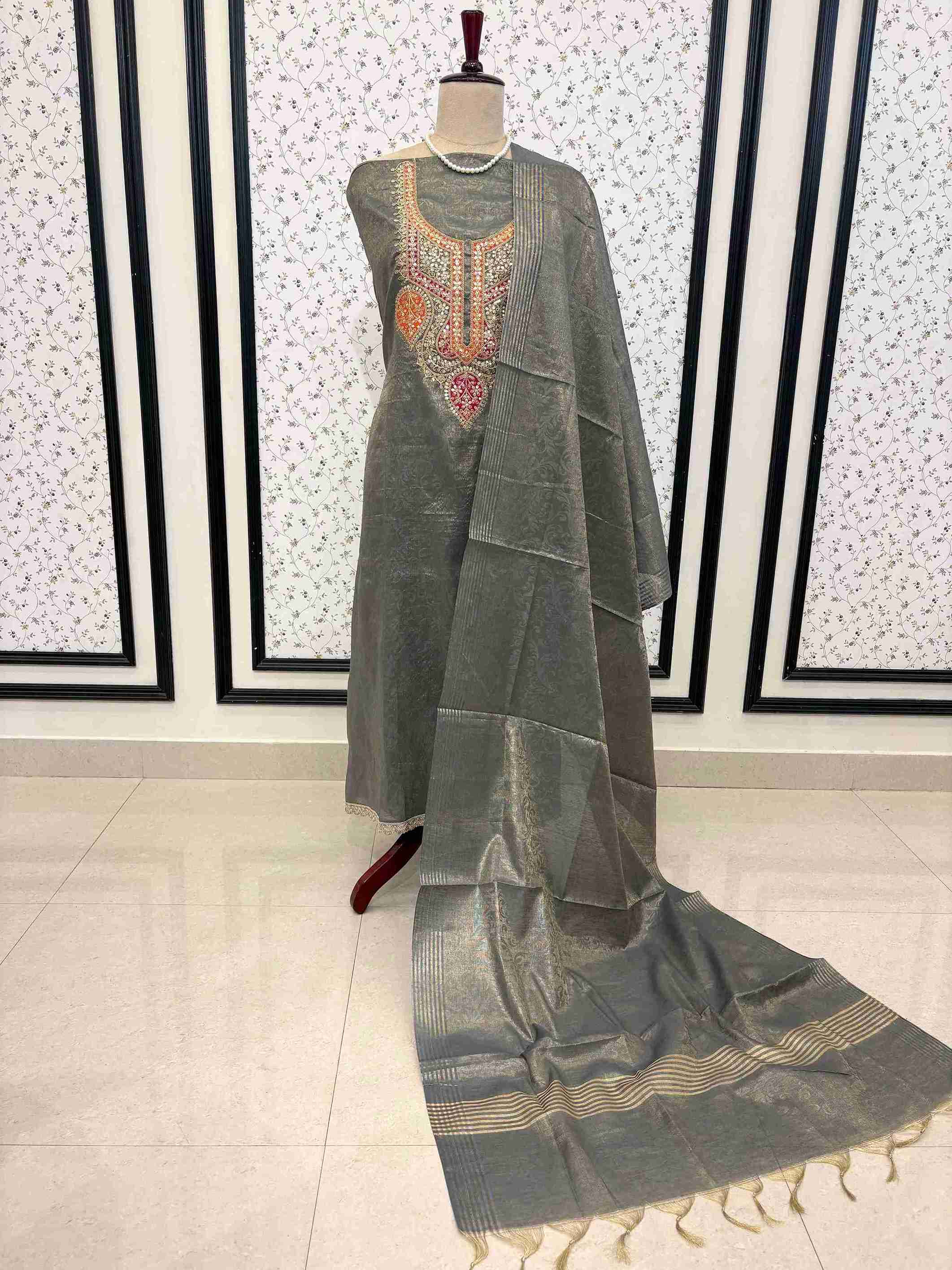 Complete grey tissue unstitched suit set with dupatta and opada silk bottom on manequinn