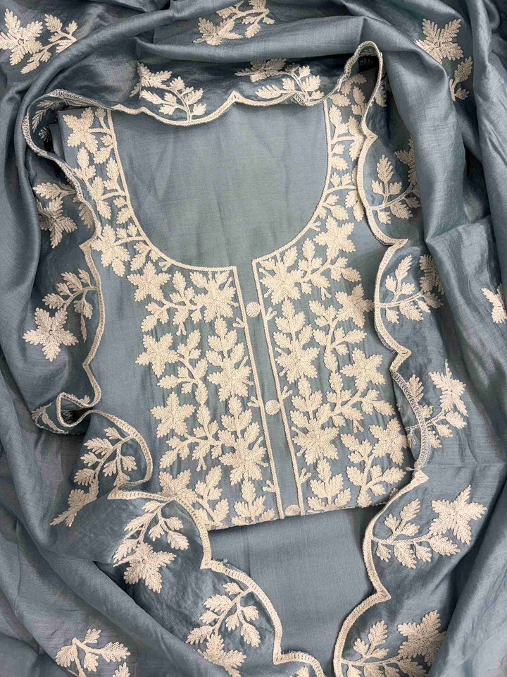 Scattered crotia floral motifs across greyish blue jaam cotton shirt body with crotia lace hemline border
