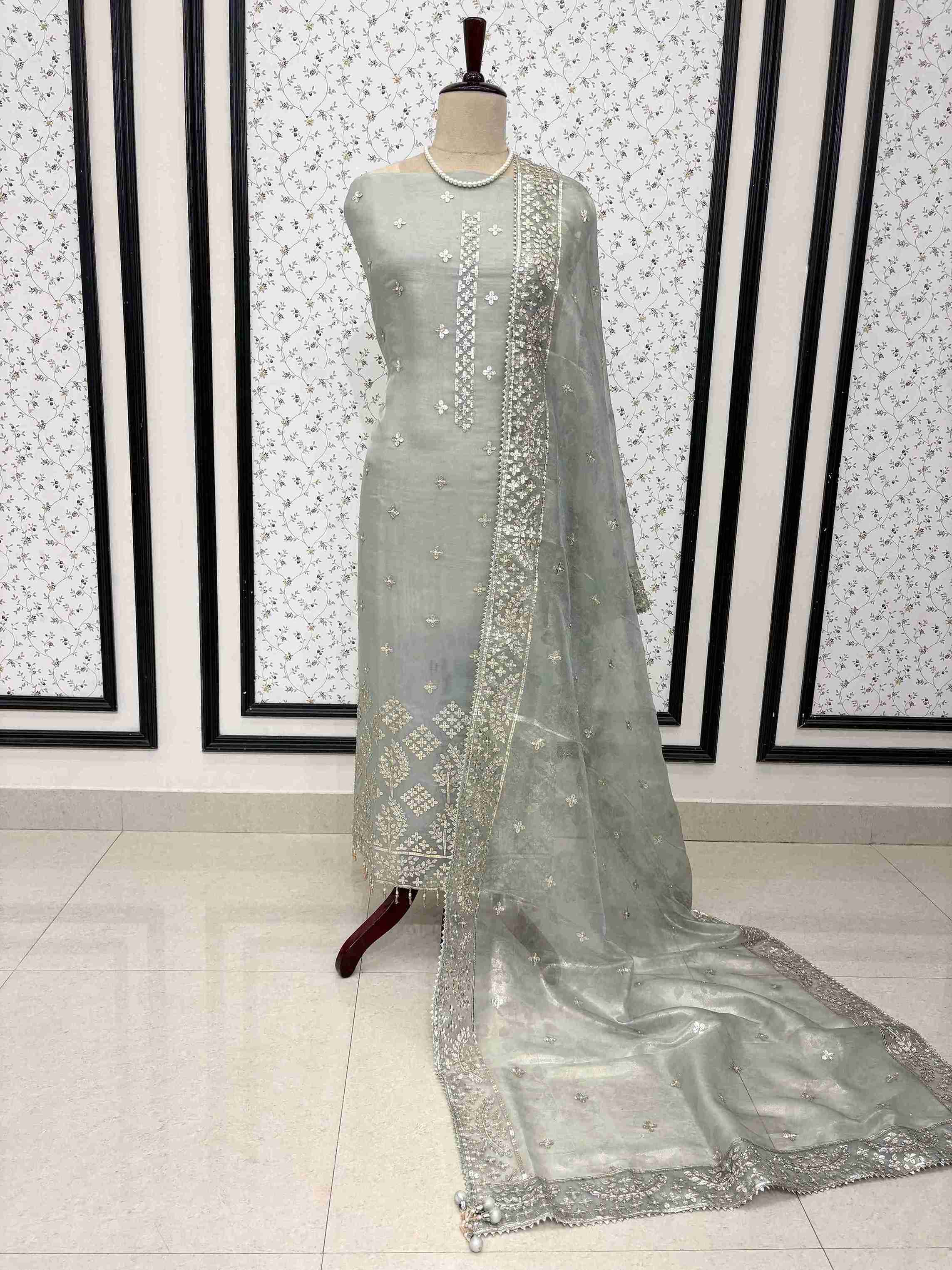 Ice blue tissue unstitched suit full front view with four-sided gota border dupatta draped on mannequin