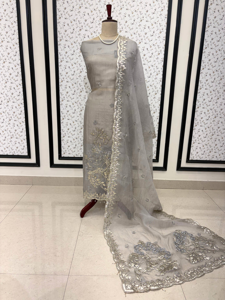 Silver gota border and motifs on marble chiffon dupatta