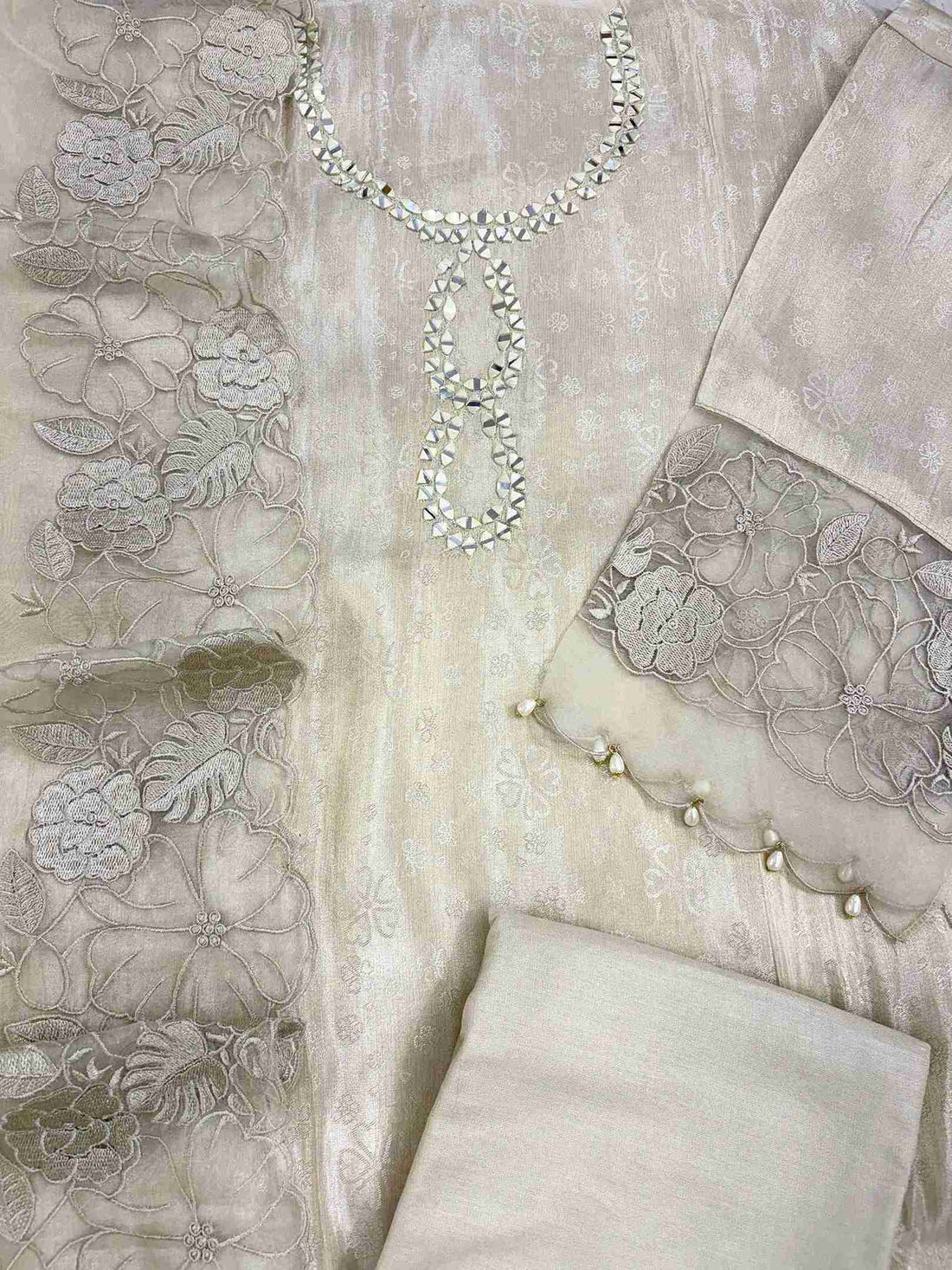 Ivory Giraffe unstitched suit set flatlay with dupatta and bottom