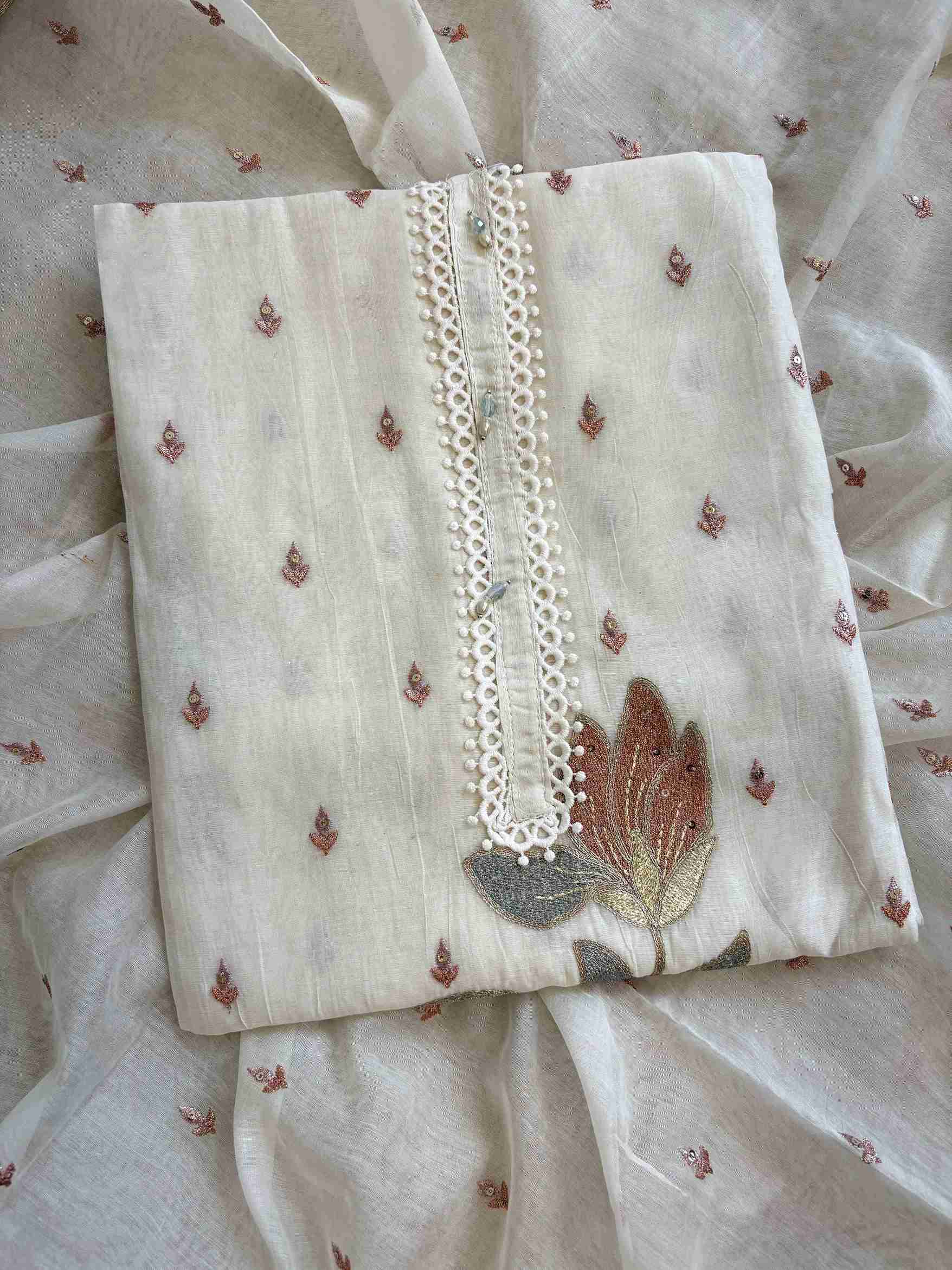 Detailed floral embroidery from daaman to neckline on mul cotton shirt