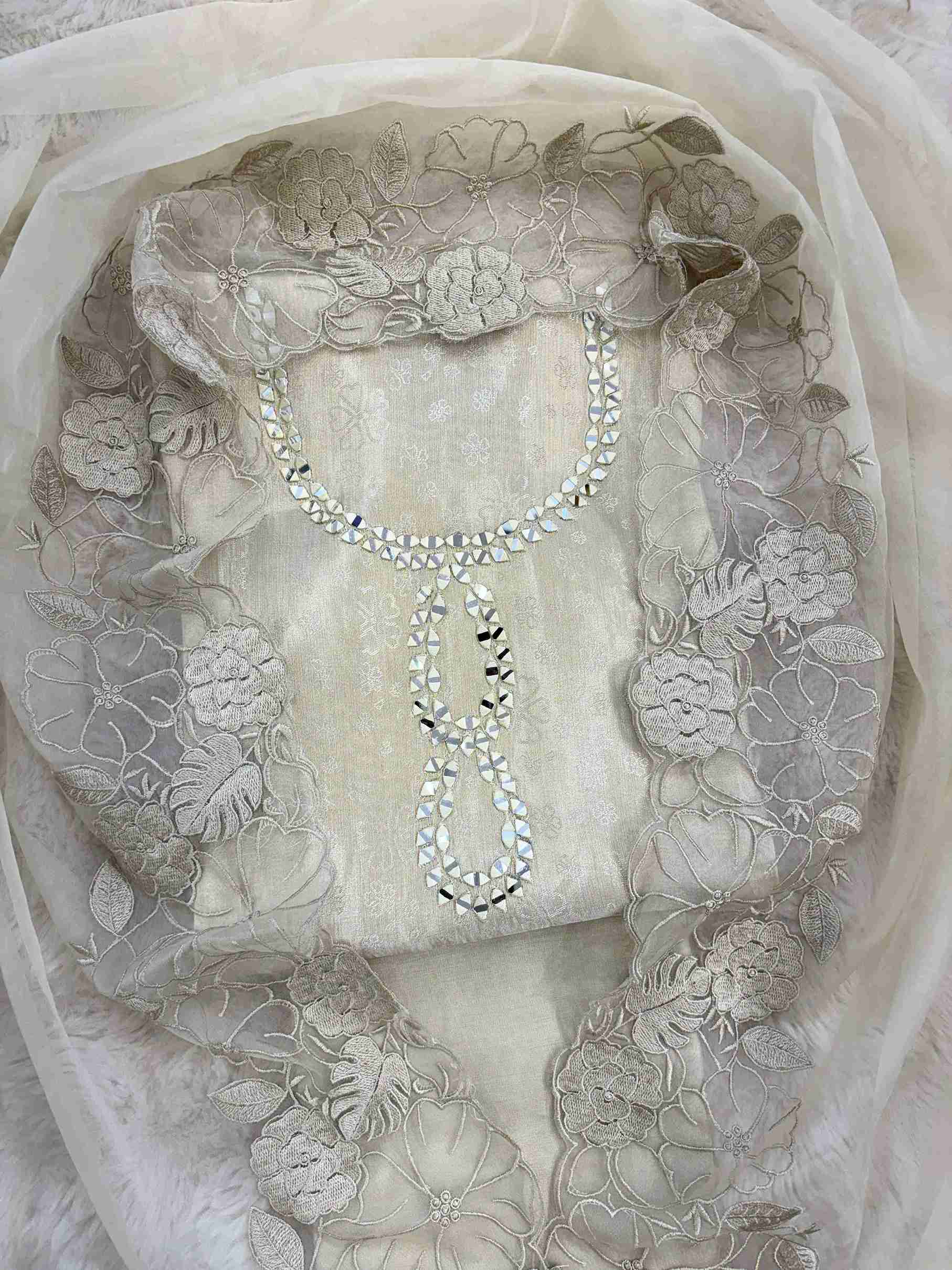 Ivory organza dupatta with self impression floral cutwork lace