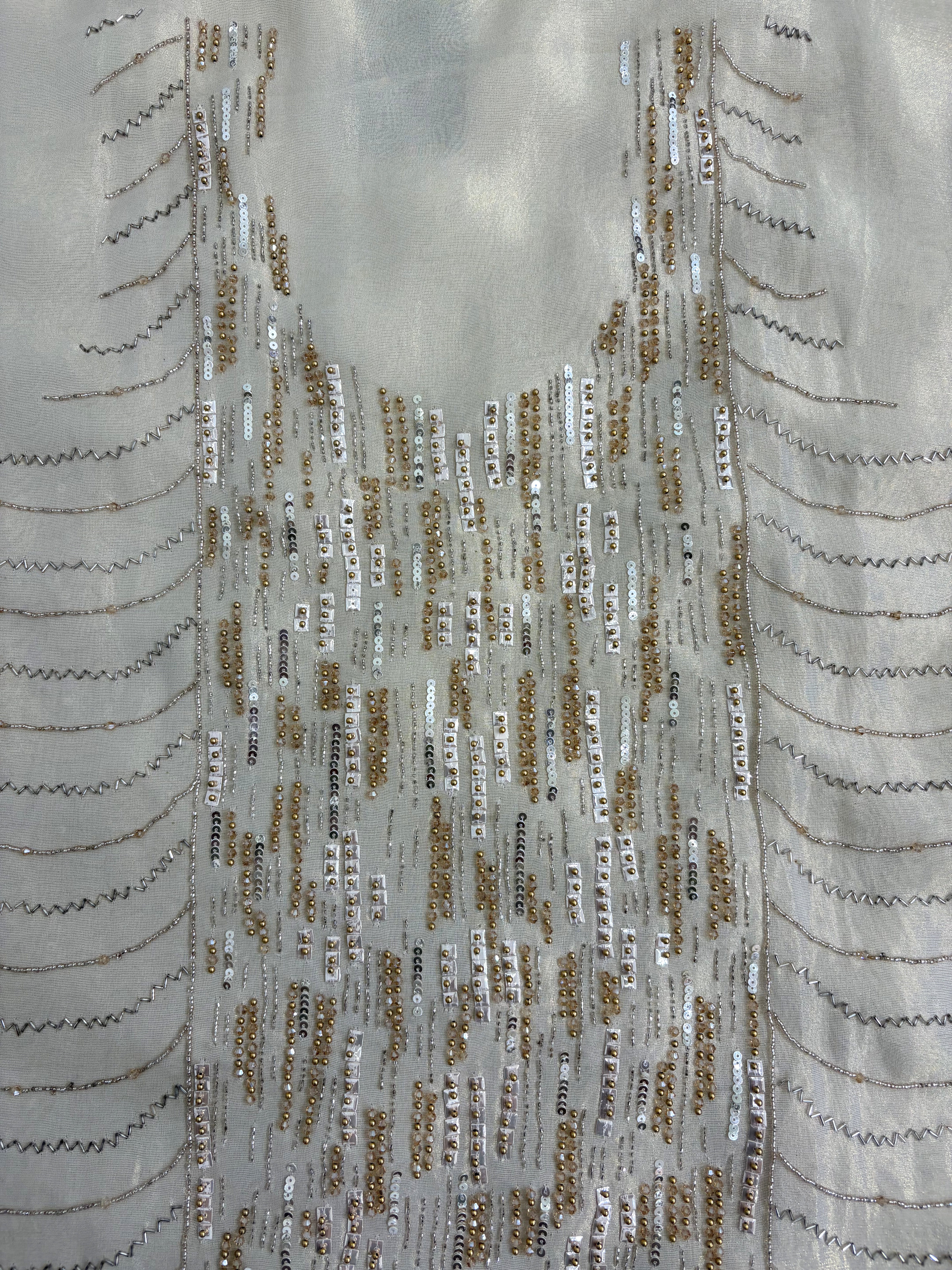 Shimmer tissue fabric texture in soft ivory shade