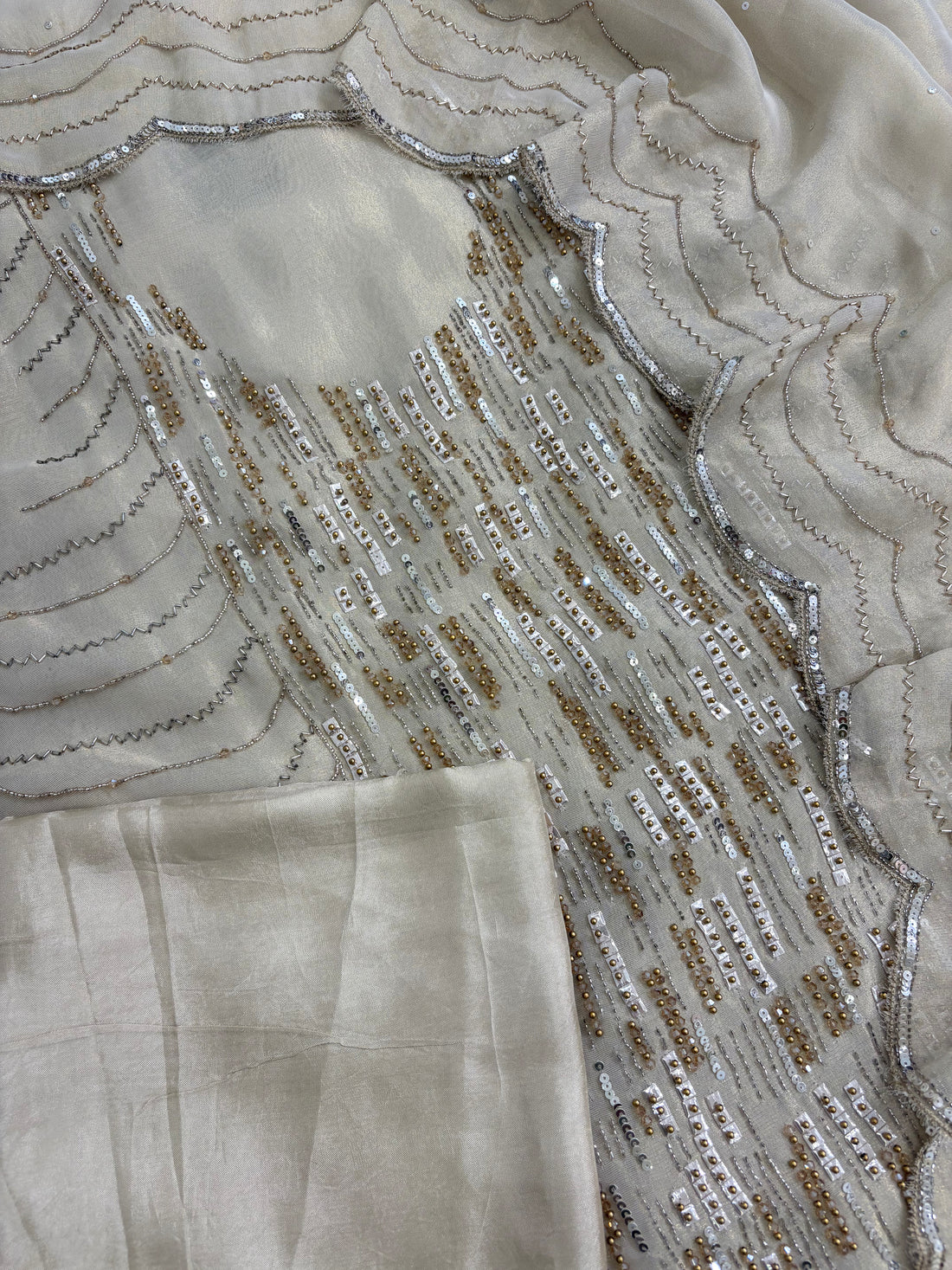 Shimmer tissue fabric texture in soft ivory shade