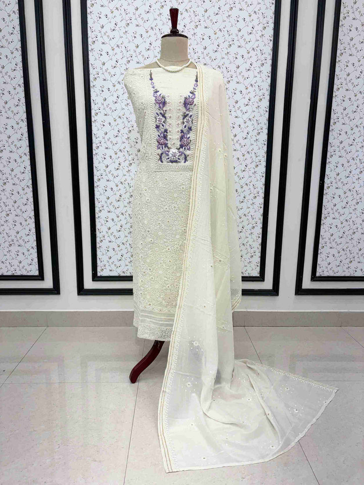 Ivory white cotton chikankari 3 piece suit with dupatta on manequinn