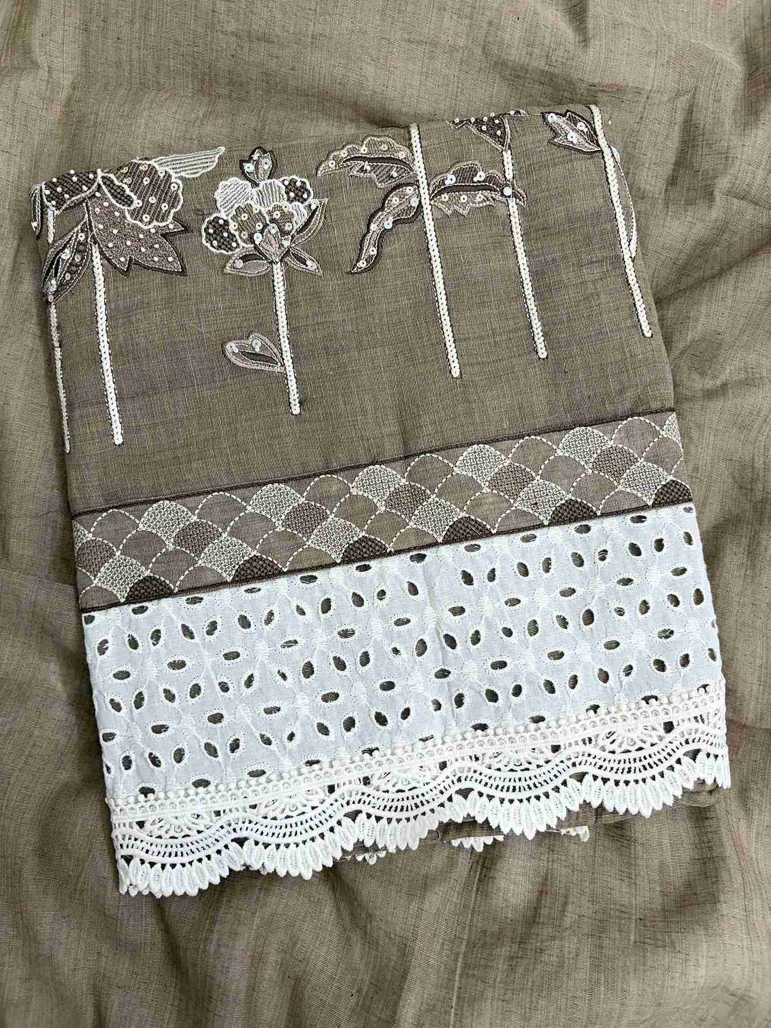 Broad schiffili cotton hem border with crotia lace at the bottom of khakhi mul chanderi shirt