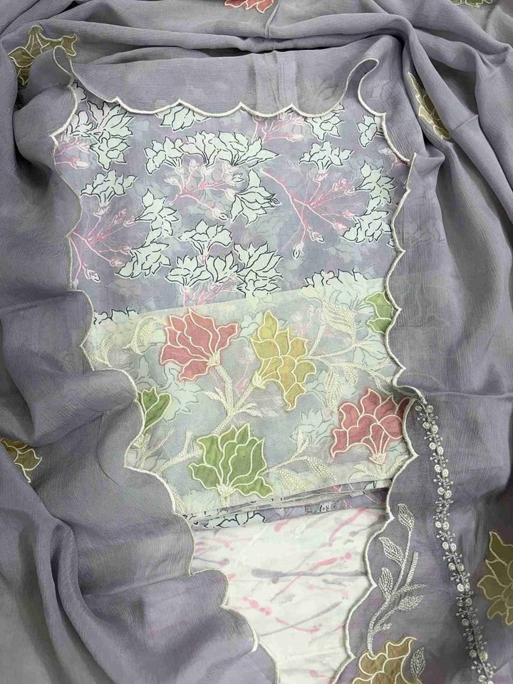 Close-up of all-over white floral print with blooming clusters and branches on pink cotton shirt body