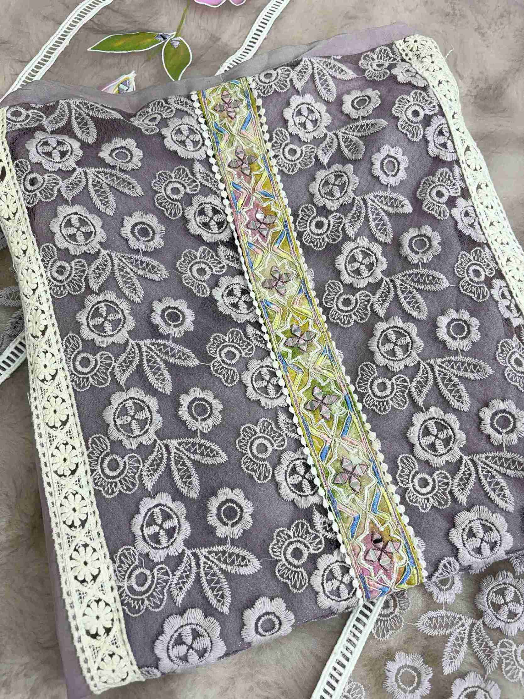 White lace panels running across the full length of lavendar organza shirt body