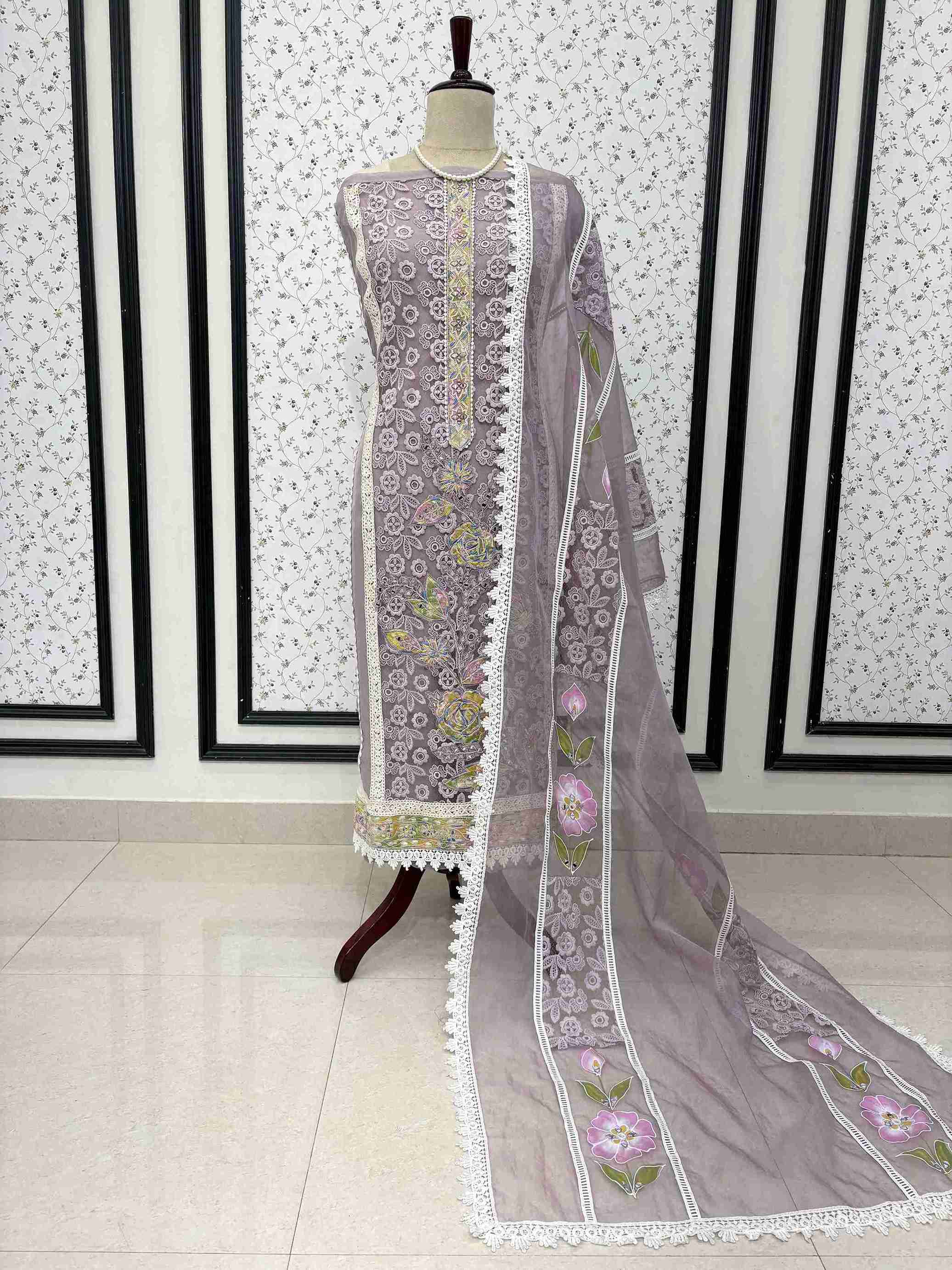 Lavendar organza unstitched suit full front view with hand-painted floral dupatta draped on mannequin