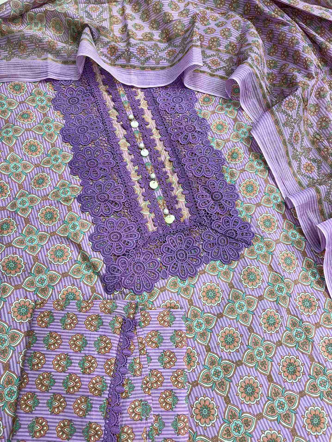 Complete lavender cotton unstitched suit flat lay set with geometric floral printed shirt, dupatta, and matching cotton bottom
