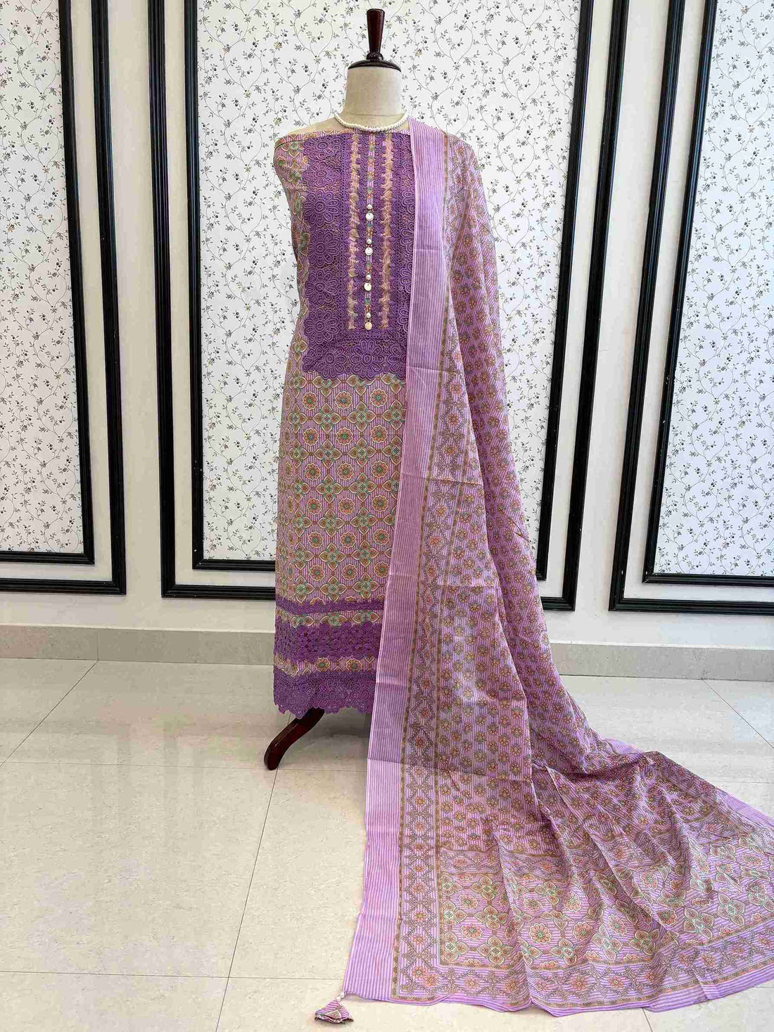 Lavender cotton unstitched suit full front view with matching geometric floral printed dupatta draped on mannequin