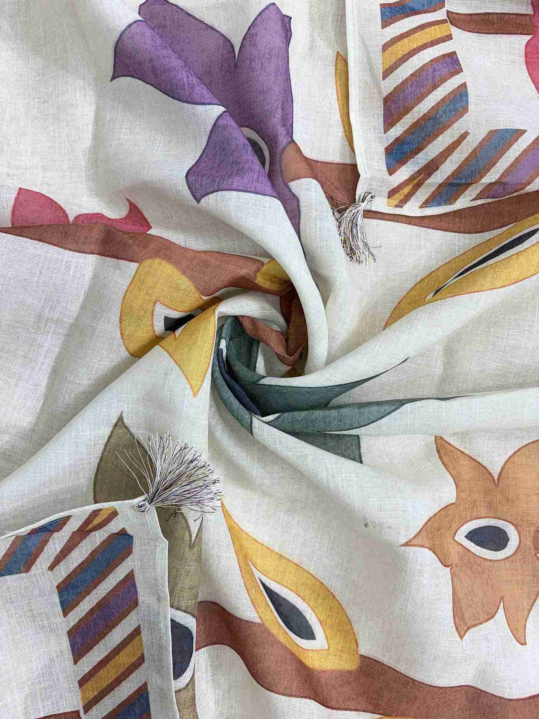 Large-scale multicolor geometric botanical leaf print in red, purple, olive, and mustard tones on light pista linen dupatta